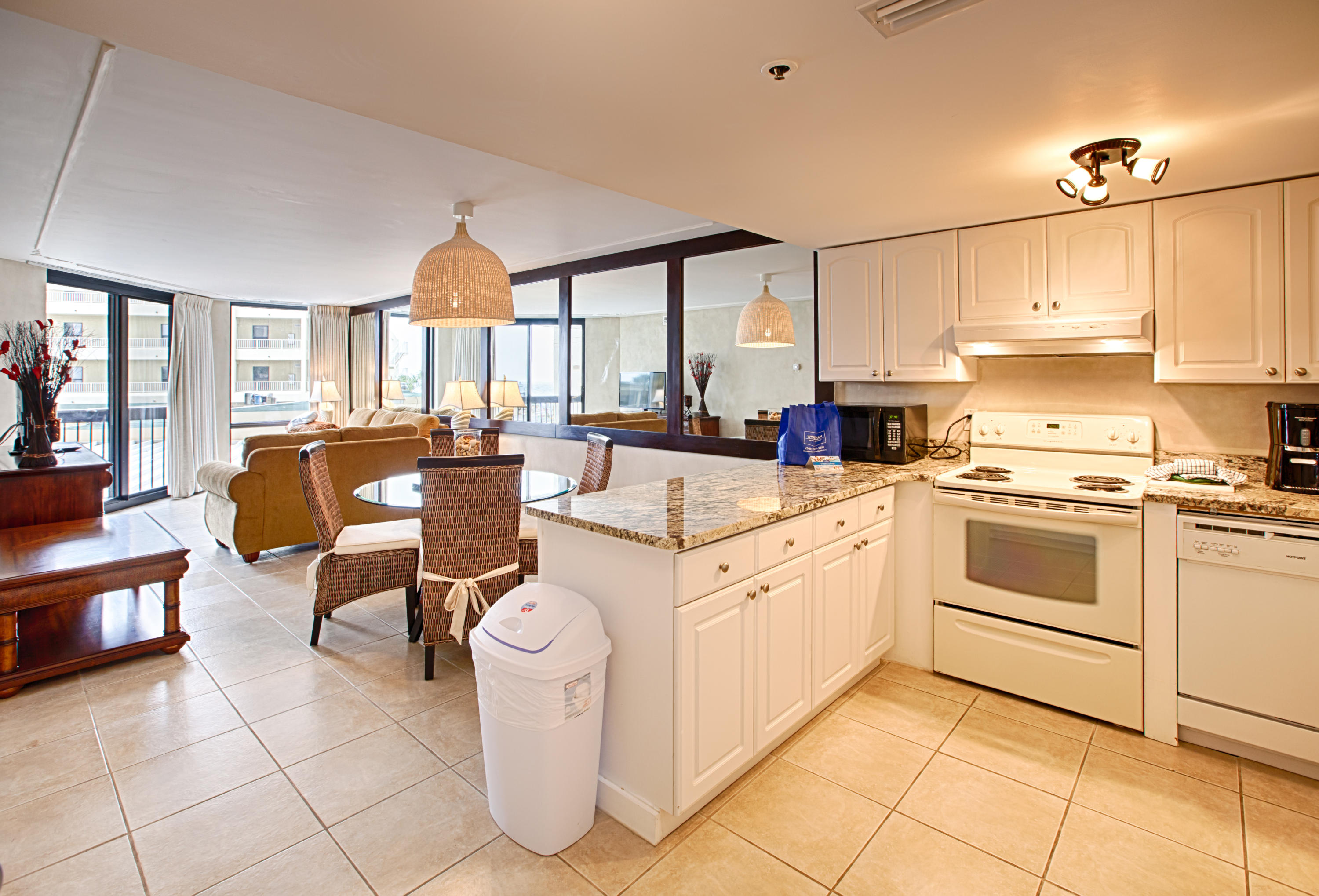 This unit has been completely renovated! Unit features tile floors in the kitchen, dining area, living room and baths and laminate wood floors in the bedroom. The kitchen features white cabinets with granite counter tops and a stainless steel refrigerator. The bathrooms feature decorative furniture vanities and a beautifully tiled shower with glass bypass doors. Sundestin is the perfect Destin destination as it has all the amenities you'd want in a resort. Sundestin has two pools one of which is indoor and a splash pad for the little ones. There's also an indoor sauna & steam room, onsite massage therapy, fitness room, game room, meeting/conference rooms, beach side Tiki Hut Bar & Grill, and an on-site restaurant, The Cabana Cafe.