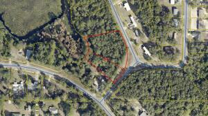 WATERFRONT LOT,  LAKE JUNIPER NEAR DEFUNIAK SPRINGS.  Enjoy 50 feet of lake frontage on a quiet BASS fishing lake.  Tucked away in a peaceful private setting yet minutes from the charm and convenience of DeFuniak Springs.  This  Lakefront lot offers the perfect blend of seclusion and accessibility. Ideal setting for nature lovers, and anyone dreaming of a tranquil retreat. Survey is available and once this parcel is sold it will receive its own legal description. Tap fees to be paid but else trip and water are available.  Adjacent lots 36 & 37 are also available, offering a rare opportunity to expand your lakefront footprint.  You can build now or hold for the future.Taxes are now bundled for all 3 lots will be separated with sale.