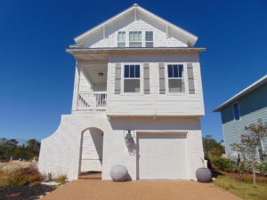 Stunning fully furnished four bedroom home for rent in Inlet Cove on the Gulf Coast! Just a short drive away from Pier Park, (top local shopping and dining), Destin and a few steps away from Inlet Beach access, this spacious house is three stories with a glimpse of the Gulf of Mexico. The first level features the garage, a full bathroom and two bedrooms with walk in closets. While the second level contains formal living room and dining room, one bedroom, kitchen with all stainless steel appliances and the laundry room with full size washer and dryer. The third floor boasts the master suite, with walk-in closets and a reading nook with a glimpse of the Gulf Of Mexico. The master bathroom has walk in shower separate bath. NO PETS.