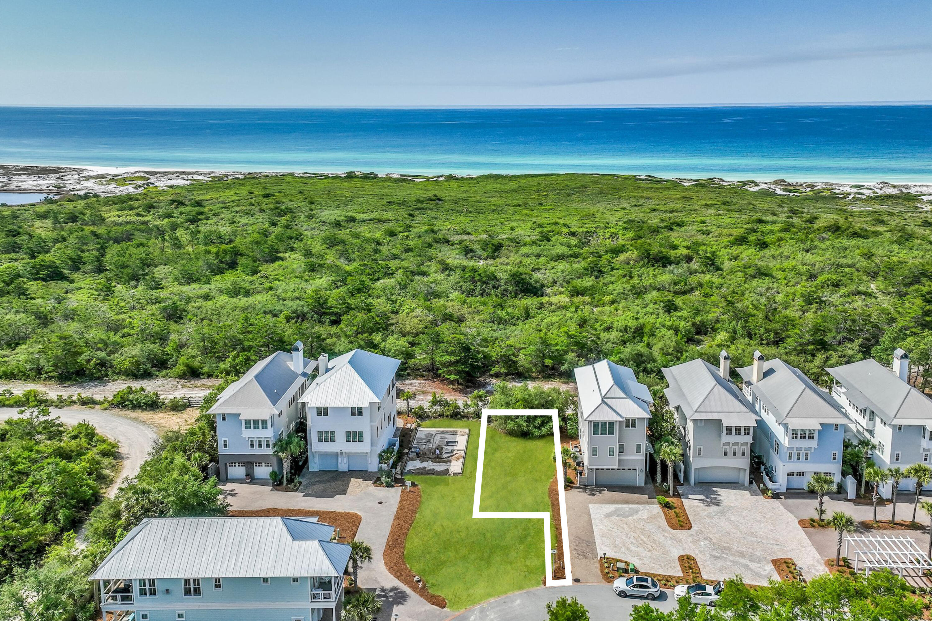 Stunning Gulf views will be offered from the home to come on this front row lot in Cypress Dunes! This is the Leeward plan, which offers 3 stories, 4 bedrooms/4.5 baths, and a 2 car garage. Please request the full spec and features sheet for details, but just some of it's features will include 9 and 10 foot ceilings, solid core doors, elevator, fireplace, shaker style kitchen cabinets, quartz counters, impact rated doors and windows, and much more!  THIS IS A TO-BE-BUILT LISTING, CONSTRUCTION WILL BEGIN ONCE A SIMULTANEOUS CLOSING OCCURS ON THE LOT ($680,000) AND THE CONSTRUCTION CONTRACT ($1,381,000). CONSTRUCTION TIME IS APPROX. 18 MONTHS FROM THE TIME PERMITS COME IN. BUYER MUST BE PRE-APPROVED FOR A CONSTRUCTION PERM LOAN THROUGH A CYPRESS DUNES APPROVED LENDER. Nestled in such an incredible landscape is this lovely lot and a beautiful Florida cottage home for buyers who seek impeccable style in a contemporary, new home. Yet to be built on this parcel, this stunning large beach residence will incorporate high quality materials. Everything here speaks softly of enchantment paired with luxury and a touch of romance. Tucked in among the 44-acre development are state-of-the-art fitness facilities, an infinity edge pool, covered outdoor fireplace, owner's gathering room with commercial kitchen and more. All bathrooms will offers matching Quartz counters. The home will also feature two HVAC units as well as a Rinnai tankless water heater. Cypress Dunes is a luxury resort community tucked away on Scenic Highway 30A. Conveniently located at the West end of 30A, just one block from a award winning Elementary school, minutes from shopping, entertainment, dining and more. The well known Sandestin Golf & Beach Resort is just 5 minutes away with award wining championship golf courses, 15 world class tennis courts, marina, championship golf courses, 15 world class tennis courts, 113-slip marina, water sports and the famous Baytowne Wharf! Grand Boulevard has a new movie theatre, Publix grocery, Sacred Heart Hospital, name brand shopping and restaurants like Flemings Steak House, Vintij Wine Bar, Tommy Bahamas, and more. This amazing subdivision consists of 44 acres situated 25 feet above sea level and is in an ''X'' flood zone, so flood insurance is not required. Cypress Dunes is known for its landscaping of native plants, a 200 year old Cypress Head, state of the art amenity center, and breathtaking views of a Coastal Dune Lake and the Gulf of Mexico! Completely surrounded by Topsail Hill State Preserve so the views are unobstructed. Topsail Hill State Park offers 3.2 miles of secluded white sandy beaches, kid activities, nature trails, camp sites and a tram to the beach. The Cypress Dunes amenity center boasts an infinity edged pool, hot tub, workout facility, outdoor covered fireplace, 2nd level sunset deck, and an owners party room with a commercial kitchen, all overlooking the Gulf of Mexico! Other amenities include a 2nd pool in Phase 2, boardwalks through the Cypress Pond, tennis courts, and a plush lawn area for recreational use! With a total of 207 home sites, this gated community has the classic Florida Cottage design consistent throughout this unique subdivision. Buyer to please verify all information contained herein including square footage, room dimensions, lot dimensions, and all else.