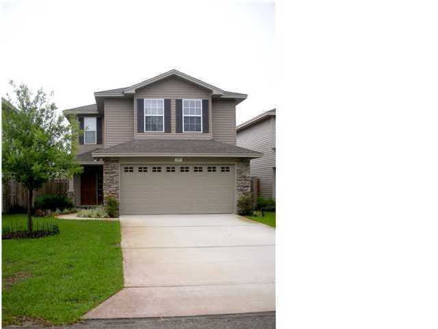 THIS CLASSY HOME HAS EXTERIOR STONE ACCENTS AND A DIMENSIONAL SHINGLED ROOF, ENERGY EFFICIENT & TOTAL ELECTRIC. SPACIOUS LIVING AREA. ATTRACTIVE KITCHEN OFFERS STAINLESS STEEL APPLIANCES INCLUDING DISHWASHER, RANGE AND MICROWAVE, PLUS QUALITY MAPLE CABINETS WITH GORGEOUS GRANITE COUNTER TOPS, DECORATIVE TRACK LIGHTING, AND BREAKFAST BAR AND PANTRY. SLIDING GLASS DOORS IN THE DINING ROOM LEAD OUT TO THE PRIVACY FENCED BACK YARD. THREE FULL BATHS HAVE CULTURED MARBLE LAVATORIES. LARGE MASTER BEDROOM EVEN HAS A SITTING AREA. MASTER BATH HAS GARDEN TUB/SHOWER, LOO CLOSET AND HI/HERS WALK-IN CLOSETS. FOUR ADDITIONAL BEDROOMS - ONE IS DOWNSTAIRS AND THREE ARE UPSTAIRS. CEILING FANS IN LIVING ROOM & ALL BEDROOMS. 2 CAR FINISHED GARAGE WITH AUTO OPENER, PROFESSIONAL LANDSCAPING &