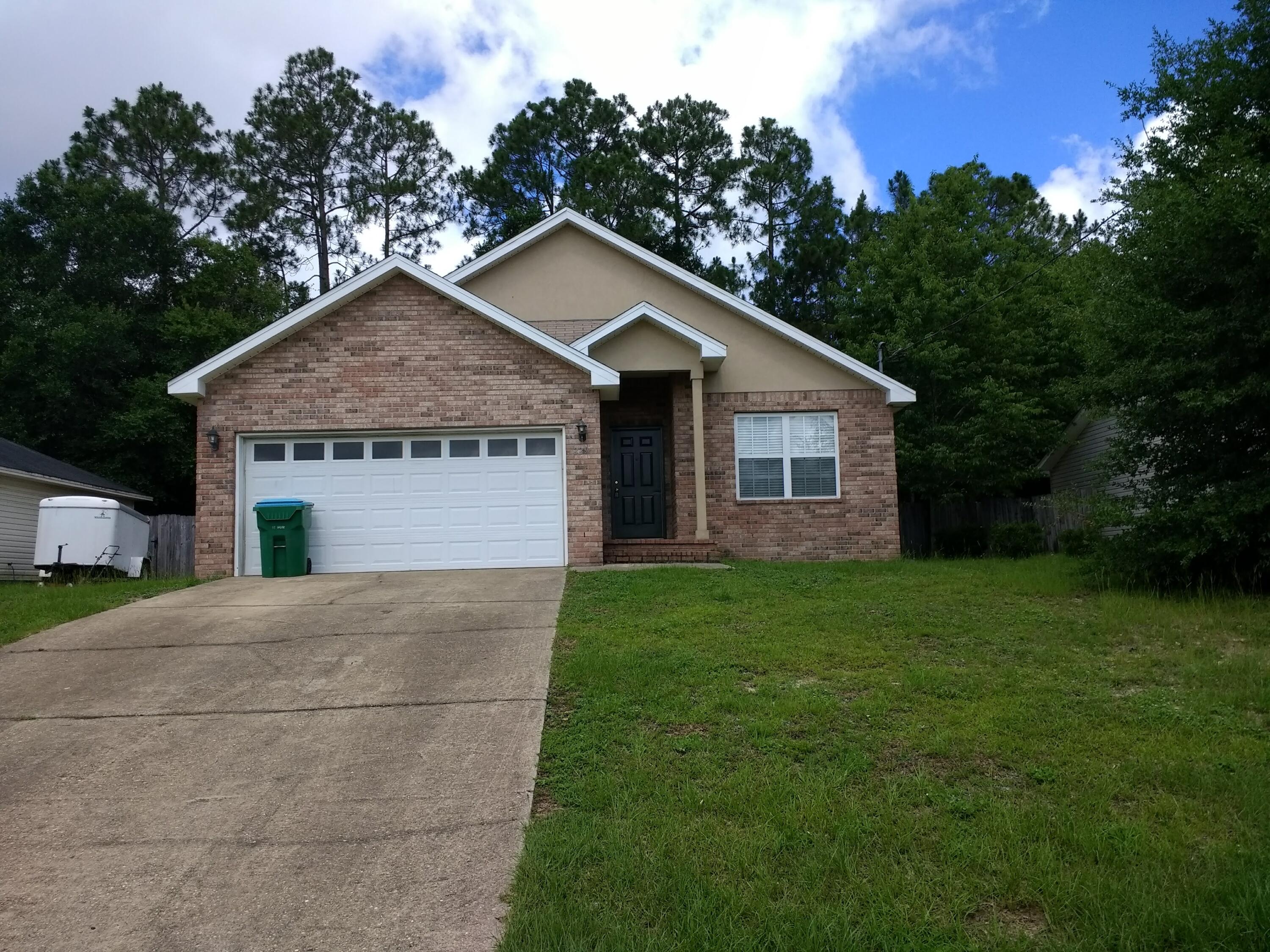 This 3/2/2, 1366sf has open, airy floor plan--great for entertaining!! Entering onto tiled foyer to left is garage door, to right-guest bedrooms & bath. Then walk into the large family/dining area & kitchen. Great plan for living space as this is where you spend the most time each day! Large breakfast bar for the ''L'' shaped kitchen with stainless stove, dishwasher, refrigerator & microwave; plenty of cabinets. Sliding door leads to privacy-fenced back yard. The family/dining as well as master bedroom boasts tray ceilings with recessed lighting. The master bath is wonderful--double vanity, garden tub, separate shower & large walk-in closet!!