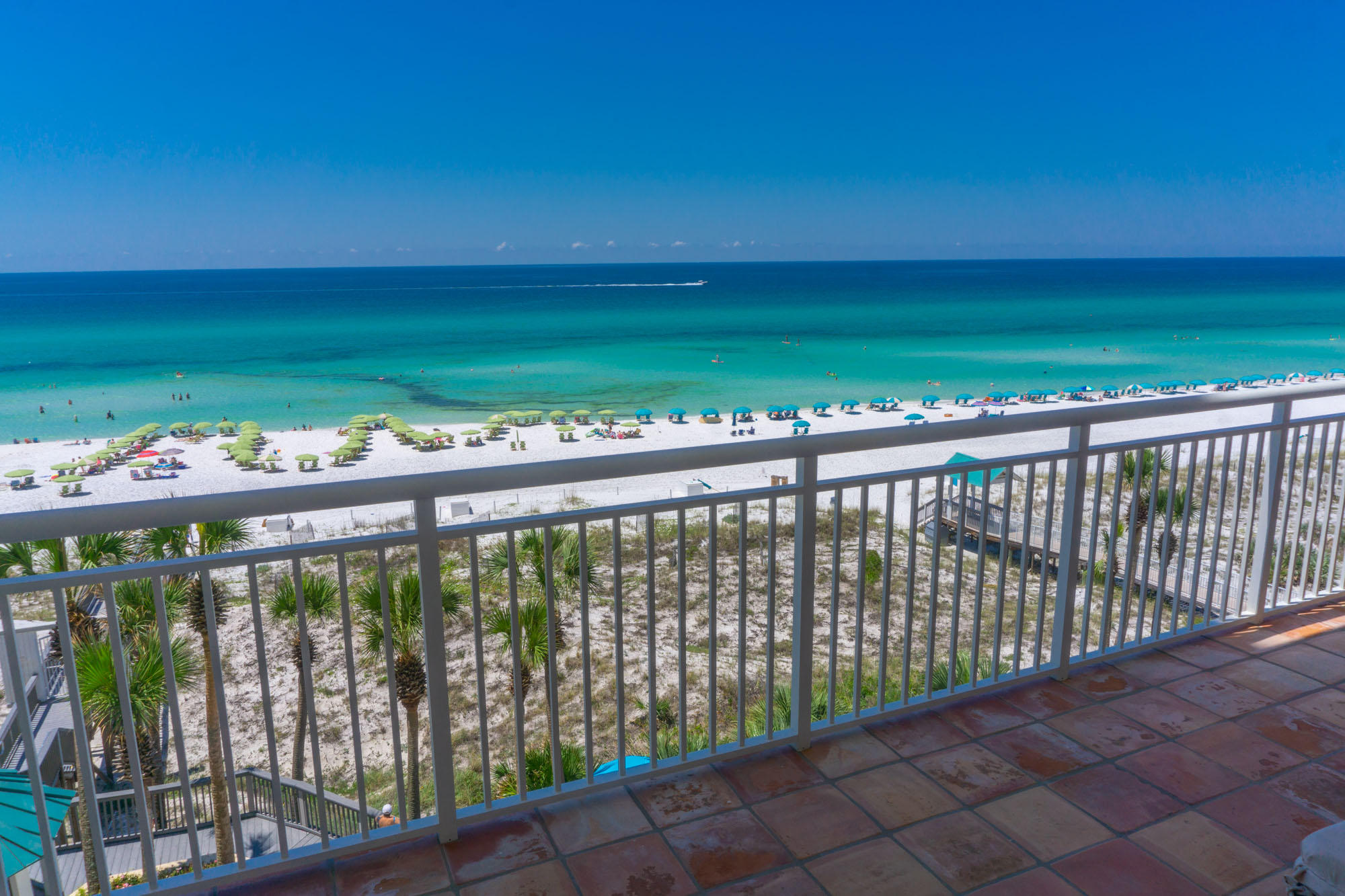 Rare rental restricted gulf front condominium makes a fabulous primary or secondary residence! Wrap around covered balcony offers generous panoramic views of the emerald green water and white sand beaches from Pensacola to Appalachicola. Built in gas grill and cooking area on the balcony conveniently accessible by the kitchen window that slides open like a balcony door, making it easy to pass food and cookware back and forth. Immaculate hardwood floors throughout the bedrooms and living area.The functional floor plan has a bathroom for each bedroom and the master bedroom is on one side of the living space while the other 2 bedrooms share the other side. Master bedroom luxuriates in gorgeous gulf views and has separate gulf front balcony access. This unit showcases the beach with a view of the sparkling gulf from most rooms.  Enjoy the following amenities of Hidden Dunes: private deeded beach access, 3 community pools (one heated,) 3 community hot tubs, professionally staffed tennis center with 6 rubico courts, basketball, pickle ball, horse shoe pit, corn hole, beach volleyball, playground, gas grills, fitness room, garage parking, community center, and 24 hour security. Grand Boulevard is just a few minutes away for grocery shopping, the best restaurants and impressive retail shopping. For more details on the community, please visit:
https://hiddendunes.mycommunitysite.app/home