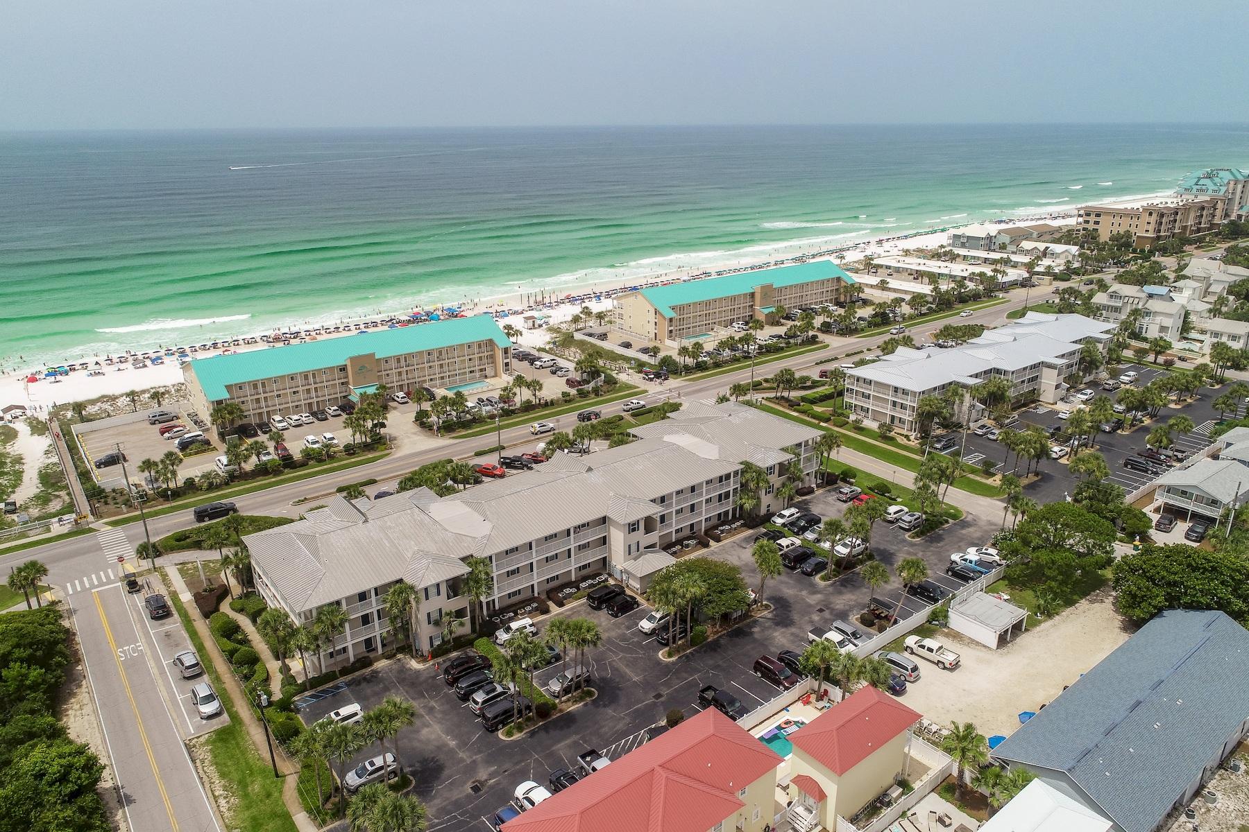 Discover this quintessential beachside condo perfectly located South of Hwy 98 in the heart of Crystal Beach close to prime beach access and offering a resort pool area. Grand Caribbean East #204 is incredibly charming, offering direct gulf views from this second floor unit in one of the lowest density complexes on Scenic 98. This unit offers an ideal open layout with great balcony space. The open kitchen & dining room offer ample convenience and optimal spacing all focused with southernly views over the resort pool area. The master bedroom suite is oversized and offers a large ensuite bathroom. Grand Caribbean East features excellent amenities including a large community pool & tanning deck, picnic area and immediate access to the white sand beaches of the Gulf of Mexico. This unit generates exceptional rental income and can be ideally utilized as a second home or investment property.