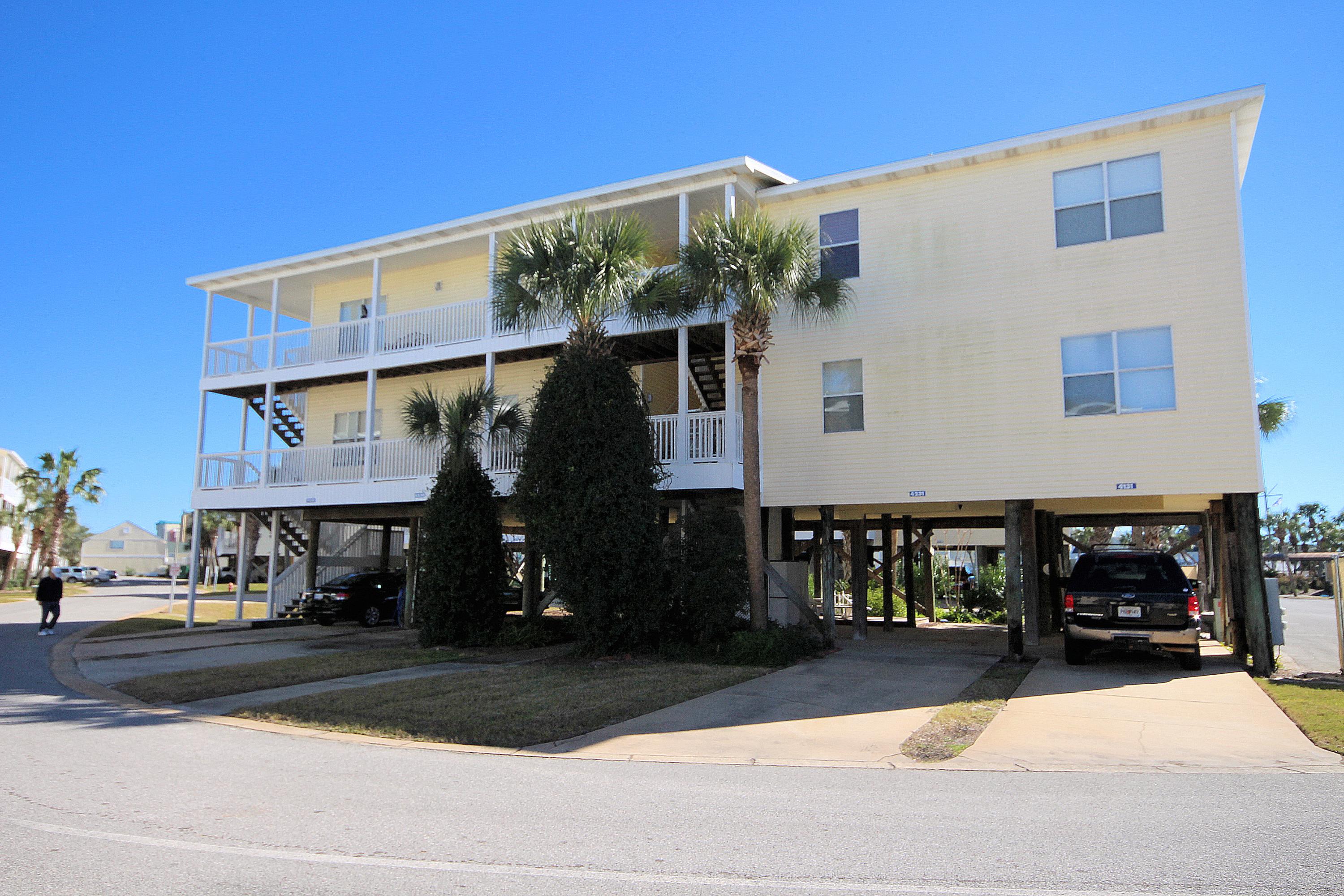 Open floor plan condo; two bedrooms each with private baths, contemporary colors and furnishings. Breakfast bar in bright kitchen central to living/dining area. Two sets of French doors in living/dining area lead to a large 37'x5' balcony. Slider in Master bedroom also accesses balcony. Covered parking for 3 vehicles under unit. Views of the harbor from front porch and swimming pool from Balcony; unit is only minutes from the Gulf of Mexico. Sandpiper Cove offers amenities including 1100 feet of private deeded beach access, Beach Pavilion bar and grill, on site restaurant, six tennis courts, 9 hole par-3 pitch and putt golf, Boat docking (in canal by reservation/availability or marina), five swimming pools all located on 43 acres in the center of Destin.