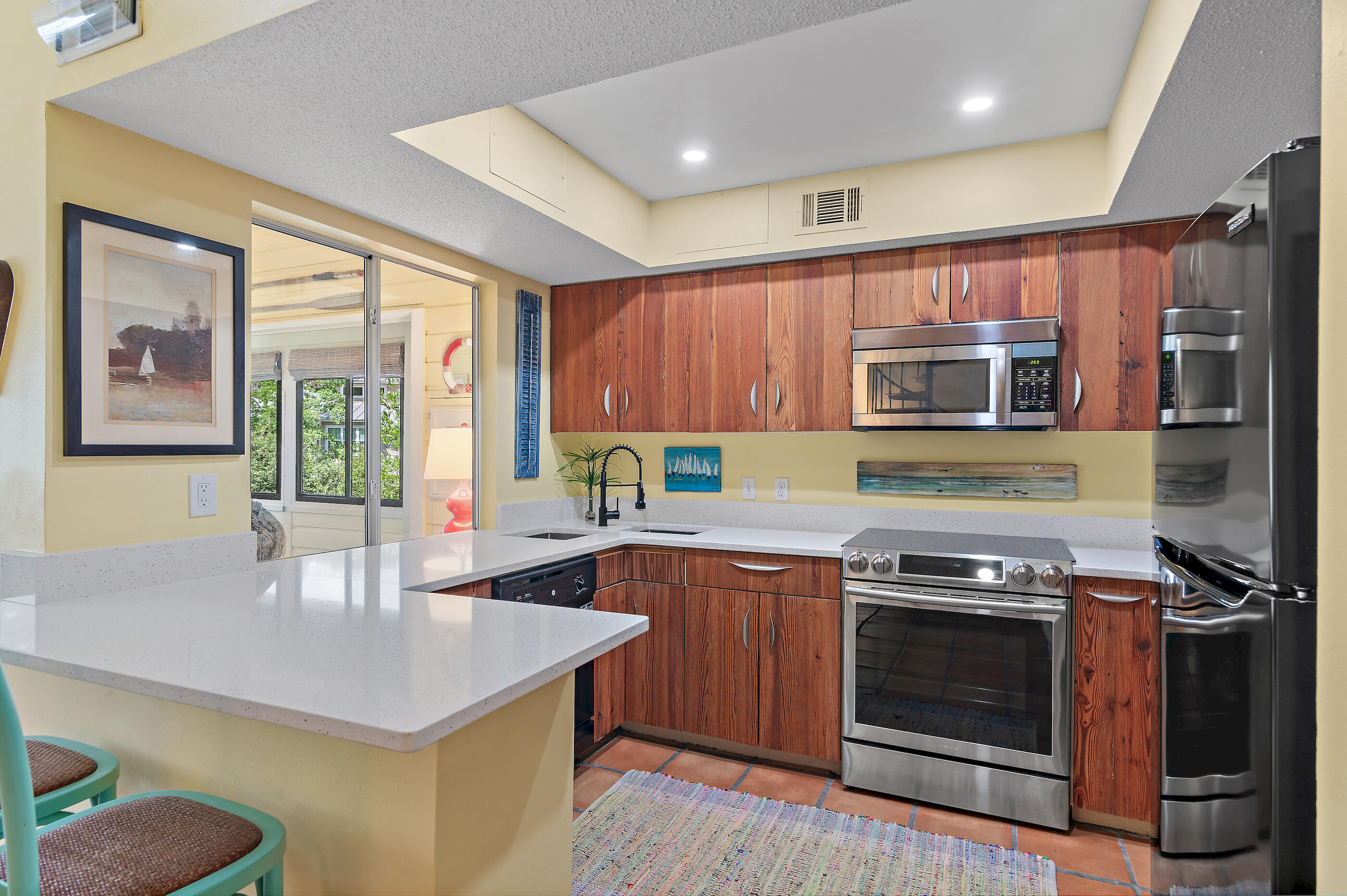 Located in a gated community with private deeded beach access, this beach cottage is full of character, charm, and quality craftsmanship throughout.
Step into an open-concept living space that's both functional and inviting. The living room is anchored by timeless built-in cabinetry and classic millwork, creating a warm and welcoming atmosphere.
Enjoy the benefit of expanded square footage—the former balcony has been enclosed and reimagined as a bright, airy dining area, effectively doubling your usable living space and offering the perfect spot to relax or entertain year-round.
The bathrooms have been elegantly remodeled, with tasteful updates that complement the home's coastal character. Additional custom touches include a built-in laundry closet crafted from rich Philippine mahogany, showcasing the attention to detail throughout.
This thoughtfully designed cottage blends style, comfort, and coastal living all within an amenity-rich, secure beachside community. 
Hidden Dunes is truly a hidden gem more peaceful and less crowded than many neighboring communities. This gated beachfront retreat offers a wide array of resort-style amenities, including a professionally staffed tennis center with six Rubico Clay Courts,3 new Pickleball Courts, seasonal beach tram service, a lighted basketball court, three swimming pools, BBQ grilling areas, and reflecting pools with flowing fountains. Enjoy scenic walking trails, lush landscaping, and the peace of mind that comes with 24-hour security.