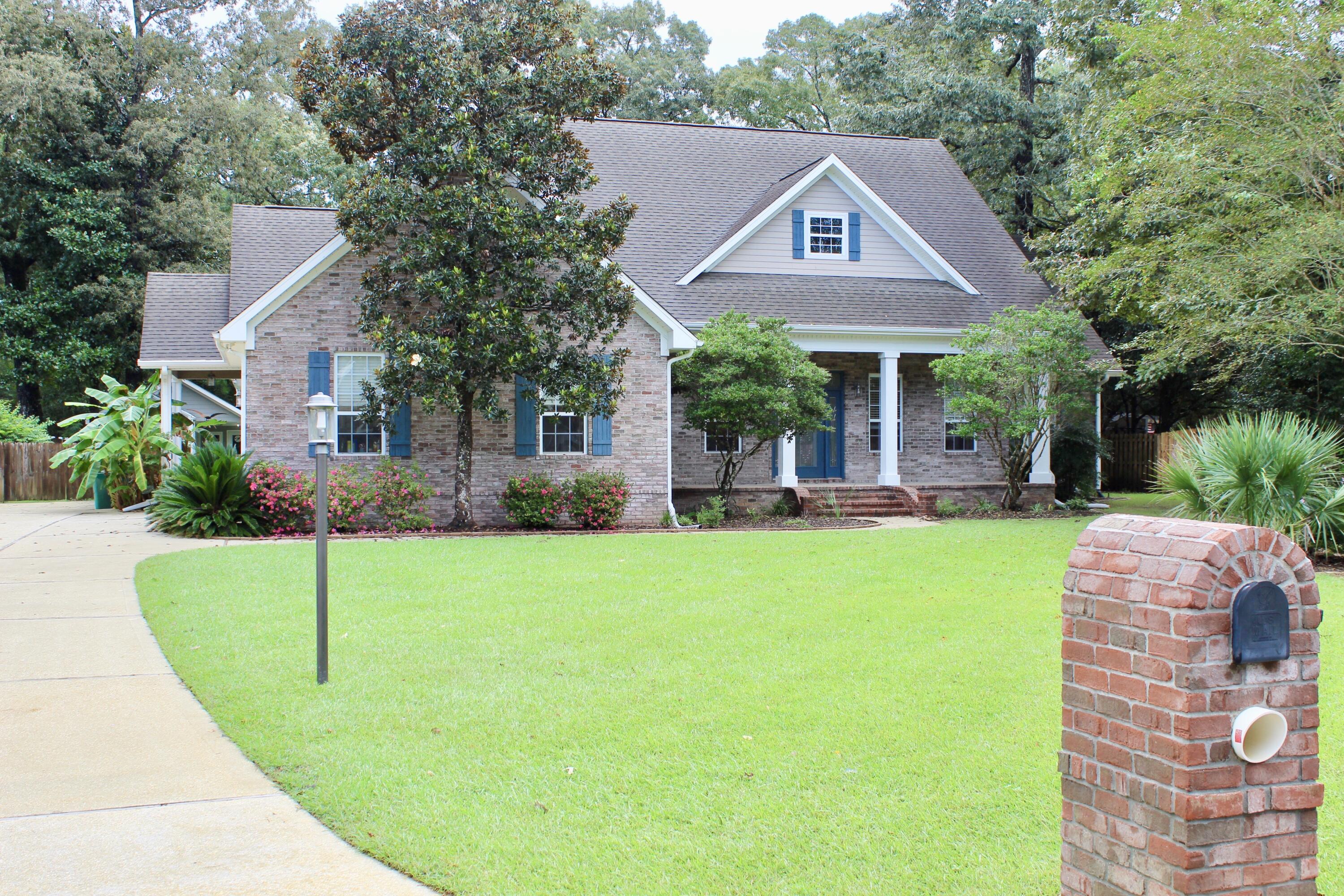 Beautiful home with a chef's dream kitchen with lots of room for entertaining. The kitchen has a bar and breakfast area over looking the back yard!This beautiful custom home has many features to included bamboo flooring through out the living room, hall and all bedrooms the rest of the house has tile, 9'' crown molding in most rooms, 2'' wood blinds convey, under-counter lighting, surround sound (whole House) with separate zones with speaker on the porch, built-in shelves & storage, mostly 8' doors for that wow factor, and so much more! The kitchen features solid surface countertops, stainless steel appliances, a DCS commercial oven w/6 burners, a center island with sink and a big bar for sitting around. The living room is open to the dining room and kitchen and spacious laundry room