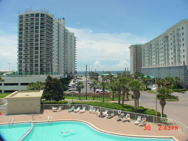 Great 2 bedroom/2 bath non-rental unit in Ariel Dunes with an extra large balcony overlooking the pool and with views of the Gulf of Mexico. This great two bedroom features 9 ft ceilings, stainless appliance's, granite countertops in the kitchen and tile thru out living area. Enjoy the two large pools totaling approximately 12,000 square feet as well as convenient deeded access to over 2,000 feet of white sugar sand beach which is less than 200 yards away. Ariel Dunes is located in Seascape - a gated community offering amenities such as golf, tennis, pools, and a conference center. Great rental or second home! All measurements are approximate and should be verified by buyer.