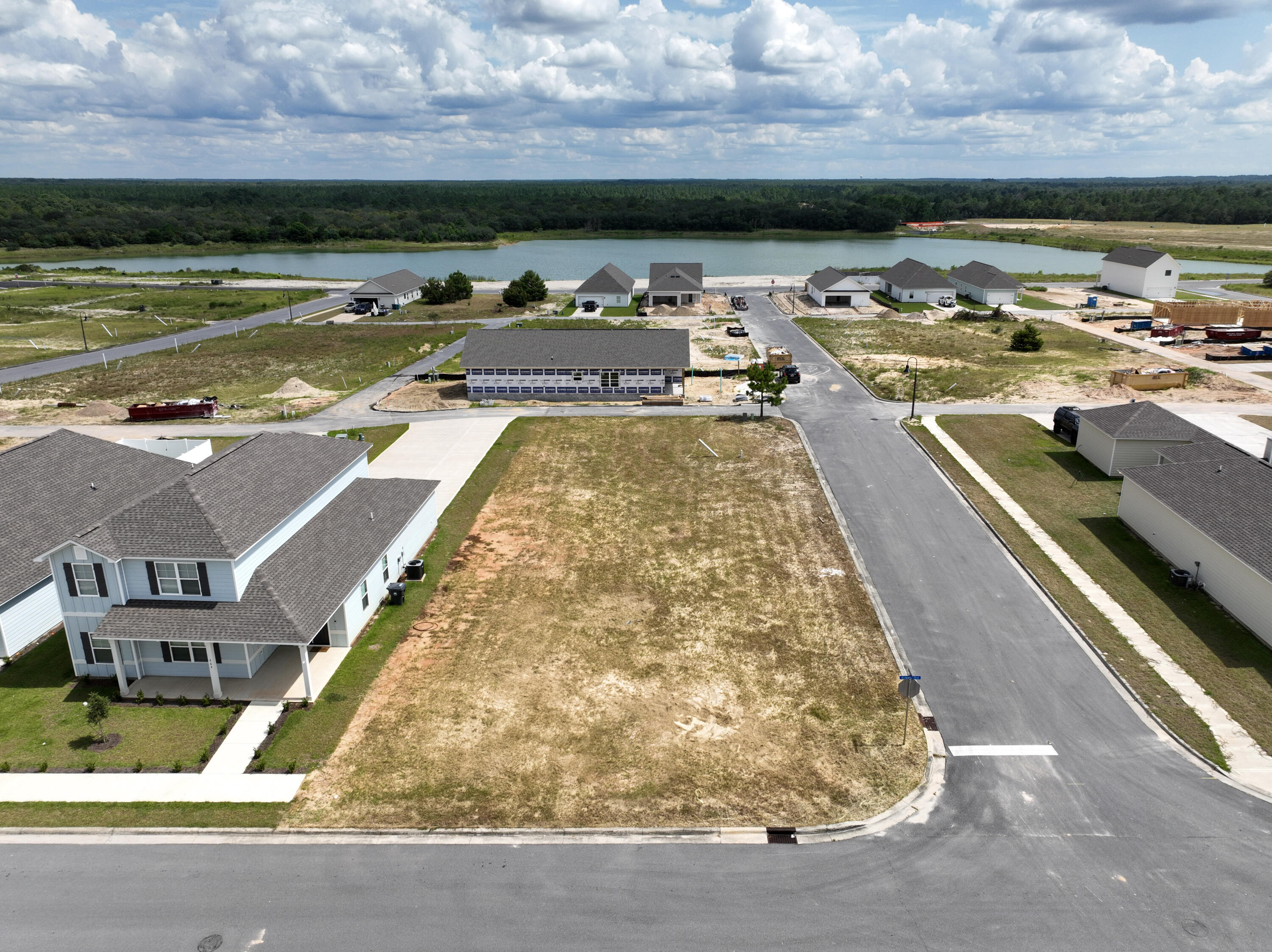 **BUILDER/MULTI-LOT DISCOUNT**Discover an extraordinary opportunity to acquire not one, but two valuable lots at a significantly reduced price. This unique offering includes the lake adjacent lot on Bluebeech, MLS# 977840, for a combined price of $139,000.  
Welcome to Owl's Head East!  Corner lot conveniently located off Hwy 331 with quick access to local schools, parks, shopping & restaurants. Only 16 miles from some of the most beautiful beaches in the World! Owl's Head Subdivision offers walking trails, a lake and large green space. Don't miss out on this unique chance to secure a strategic investment or a dream location for your future home. This offer is available to anyone, so act quickly to take advantage of this special pricing.