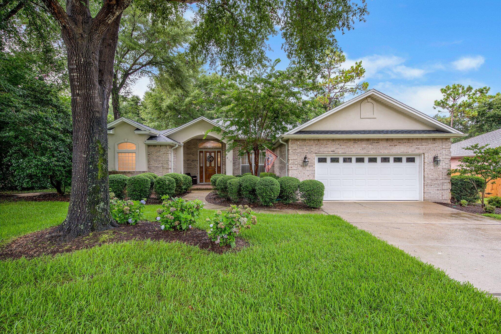 MOTIVATED SELLERS. BRING ALL OFFERS
  Schedule your showing for a Rare opportunity to buy in beautiful Swift Creek . The extra touches and loving care the owners have given this home are immediately evident in the beautiful landscaping and entry way with its beautiful front door, arched transom, and porcelain tile flooring. As you enter into the foyer, you will see that the porcelain tiling has been carried throughout the home. The 11' ceilings, crown molding, and deep base boards complete the picture of elegance. The formal dining and living rooms are open and airy. There is a convenient pocket door between the dining room and the kitchen area that can be closed to lend privacy to your dinner parties.  The transom over the passage way is of elegant leaded glass. The open floor plan of the kitchen and family room area will assure that you will never be far from your guests and family as you ''create'' in the spacious kitchen with its Corian counter tops, two pantries, and breakfast bar. There is plenty of room for a butcher block table in the kitchen. The informal dining area has a deep bay window and overlooks the great backyard. The family room features a cozy gas log fireplace just right for those chilly winter nights. Over the mantel is a unique semicircular leaded glass window that is protected by its very own hurricane shutter. The split floor plan allows for extra privacy for the master suite which you will enjoy with its trey ceiling, his and her vanities and walk-in closets, separate shower, and whirlpool garden tub. Two of the additional bedroom share the use of one of the full baths. The third additional bedroom can be made private with a pocket door from the family room, and it has its ''own'' bath at the rear of the home. There is also a convenient exit to the backyard located in that hallway. The screened-in back lanai can be accessed through the family room, dining room, or master suite. It has been completely tiled in 18'' porcelain tiles, has a ceiling fan, and is plenty big for several outdoor tables and chairs.  The utility room has wall cabinets and is conveniently located between the garage and the bedroom hallway. There are also several hall/linen closets throughout the home. The two car garage is oversized and had pull down stairs for easy access to the attic storage. Enjoy easy maintenance with vinyl trim, gutters, and a sprinkler system that utilizes the subdivision's reclaimed water system.