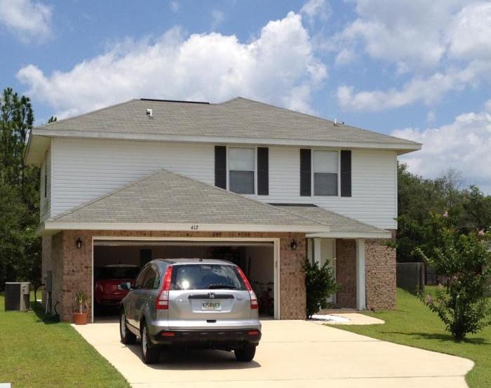 Great two story home in fantastic neighbor hood conveniently located in central Crestview. Enter into the foyer with a large coat closet to your right and the stairs leading upstairs to your left. Pass the downstairs half bath into the spacious living room. Notice the bright and stylish paint colors as you pass through the dining room into the good sized, all stainless kitchen. Head upstairs, to your left you'll find the open office/laundry room, around the corner are two bedrooms both good sized with nice sized sized closets as well as the shared full bath. Back down the hall you'll come to the rather large master bedroom with his and hers closets, and the large master bathroom with his and hers vanities and a big tub. Call today, this property will not last long!