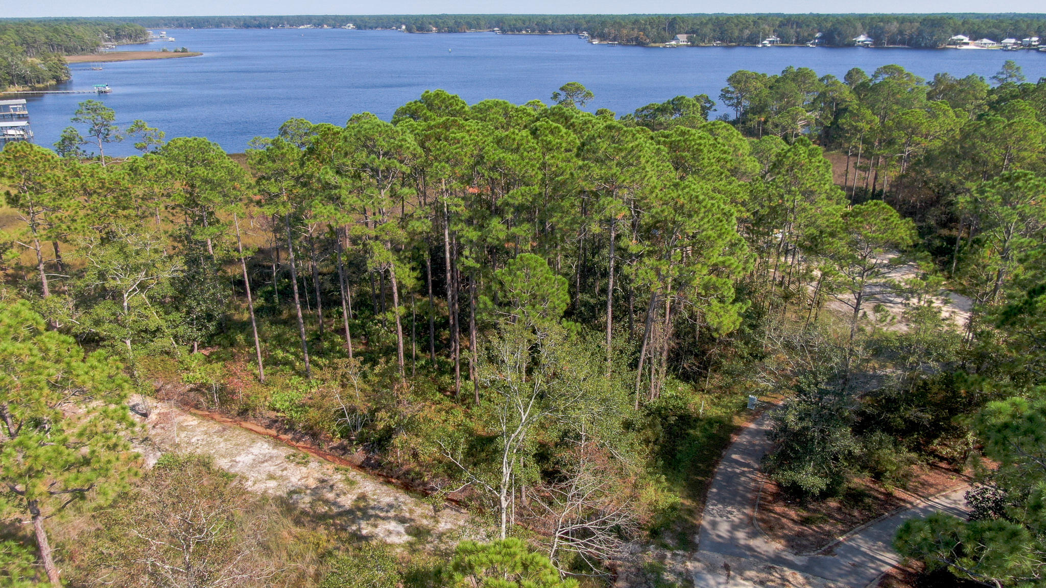 Your waterfront dream lot is now available in the quaint and private neighborhood of Cross Creek Shores. This lot has breathtaking, unobstructed views of beautiful LaGrange Bayou. Build your bayou front home on this large parcel and enjoy waterfront living at its finest. Plans included with the sale of the lot. A dock CANNOT be built on this parcel.