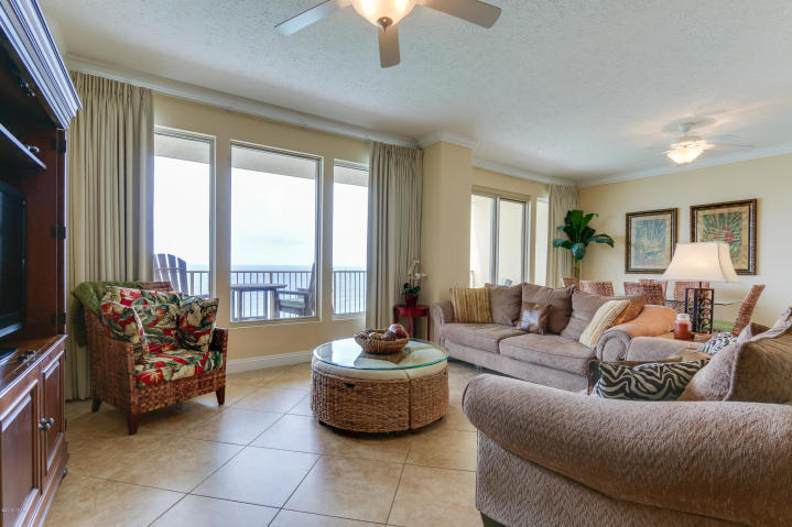 This beach inspired Gulf front 2/2 condo at Gulf Crest is the beach getaway you have always dreamed of! Riveting Gulf views are framed by immaculate interiors, designed with the Gulf of Mexico and sun in mind. Unit will convey fully furnished and rental ready! Meticulously maintained! Hard surface flooring throughout 18'' ceramic in the living area and ceramic plank in bedrooms. The gourmet kitchen features granite counters and loads of cabinet space and is fully stocked and rental ready. This condo lives large and is spacious and bright! Master bedroom on the Gulf with access to the balcony through sliding glass doors.