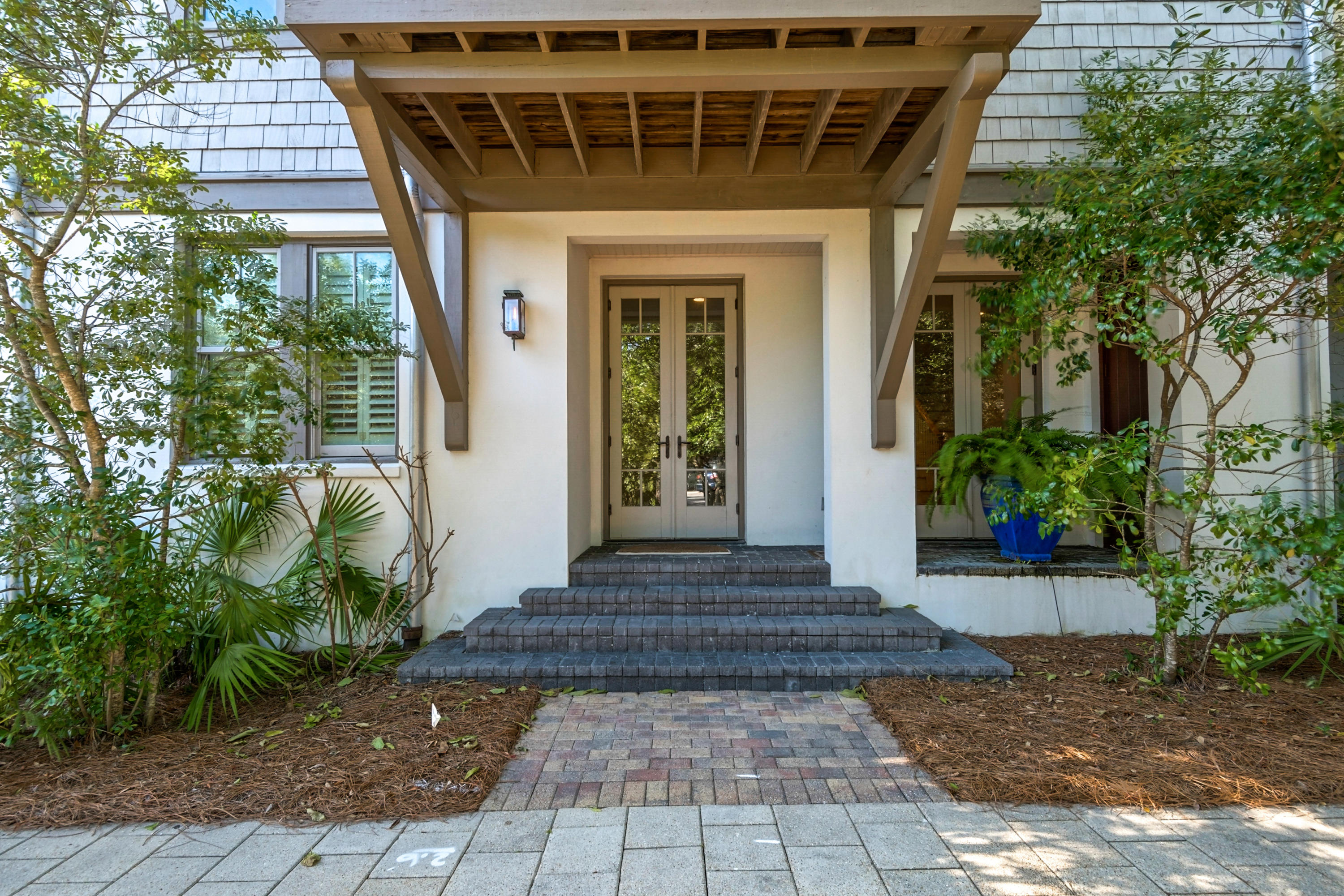 KICK OUT THRU 1/12 ACCEPTING BACK UP This Sunset Townhome features 4 levels of  spacious living in a prime location of Rosemary Beach contiguous to St. Augustine Park and Rosemary Beach Owner's Center & Pool.  Level 1 provides a lounge with wet bar, a covered porch and elevator entry as well as 2 Guest Bedrooms with ensuite baths.  Level 2 allows another lounge contiguous to a balcony, the Master Suite with private balcony, and an additional Guest Bedroom & Bath.  Level 3 has the main living with an open and inviting entertainment area perfect for hosting Family and Friends. A well equipped kitchen, a front terrace to enjoy the morning light across St. Augustine Park and a rear balcony for a grill. Level 4 is versatile as another lounge or sleeping area that  culminates in a louvered Porch louvered porch.