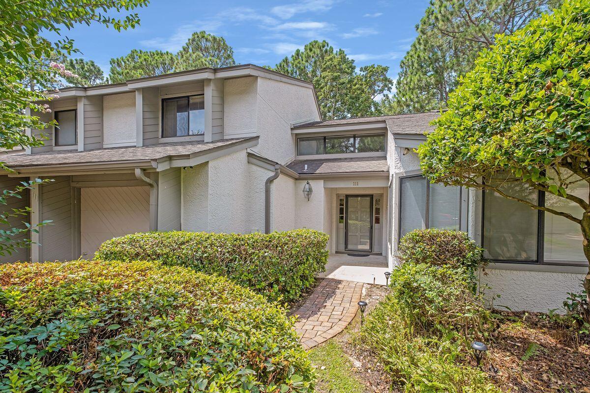 What an opportunity! Huge price reduction coupled with brand new HVAC, hot water heater and garage door opener (8/22). Priced at $167 SF! Why settle for decor someone else has selected when at this price, you can choose what you want and still be well under comps. This popular contemporary, open floor plan has three ample living areas and is centrally located in Bluewater Bay. This friendly community offers golfing, tennis, boating, sailing, water sports, swimming, private beach, 120 slip marina with restaurant/bar - all in a natural, coastal Florida paradise. Gleneagles townhomes have a well-run HOA. Roof was replaced 9 years ago. The glass-enclosed lanai is one of the few that has been insulated to insure comfortable temperatures when enjoying that area.  The home backs up to Gleneagles pool but a buffer of trees/shrubs insures privacy and tranquilty in the outdoor space. Gleneagles is located just a block away from the new Addies Place (where homes are expected to sell over $750,000).