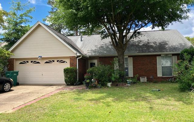 Enjoy this 4/2 conveniently located in Blue Pine Village. Home has 2 car garage, screened porch, eat in kitchen with appliances (ice maker not warranted) & large family room with wood burning fireplace. Master bedroom and two additional bedrooms are on the first floor with  another large bedroom at the top of the stairs. Master bedroom has large walk in closet and bathroom with double vanity and shower/tub combination. Indoor laundry area with washer and dryer (washer/dryer not warranted).  Owner will consider a dog or female cat only. Any pet must be spayed/neutered, house trained and up to date on all vaccinations. Requires a non-refundable pet fee. No smoking allowed!! Any person 18 years old or older must apply separately. Tenants required to carry Renter's Liability insurance