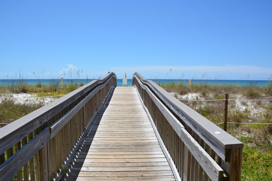A warm Gulf breeze awaits you at this amazing 2 bedroom Surf Dweller condo - located on highly desired Okaloosa Island! This condo features a highly coveted Gulf front master suite (a rare find in a 2 bedroom!) and a large living area to enjoy the beach views and breezes. This condo is fully tiled and has a large patio to enjoy the Gulf views - would be a prime rental location! Surf Dweller has lush landscaped grounds, a sparkling swimming pool, kiddie pool, tennis courts, bbq grills, beach walkover.and is located near all the best shopping, dining and entertainment the Island is known for!