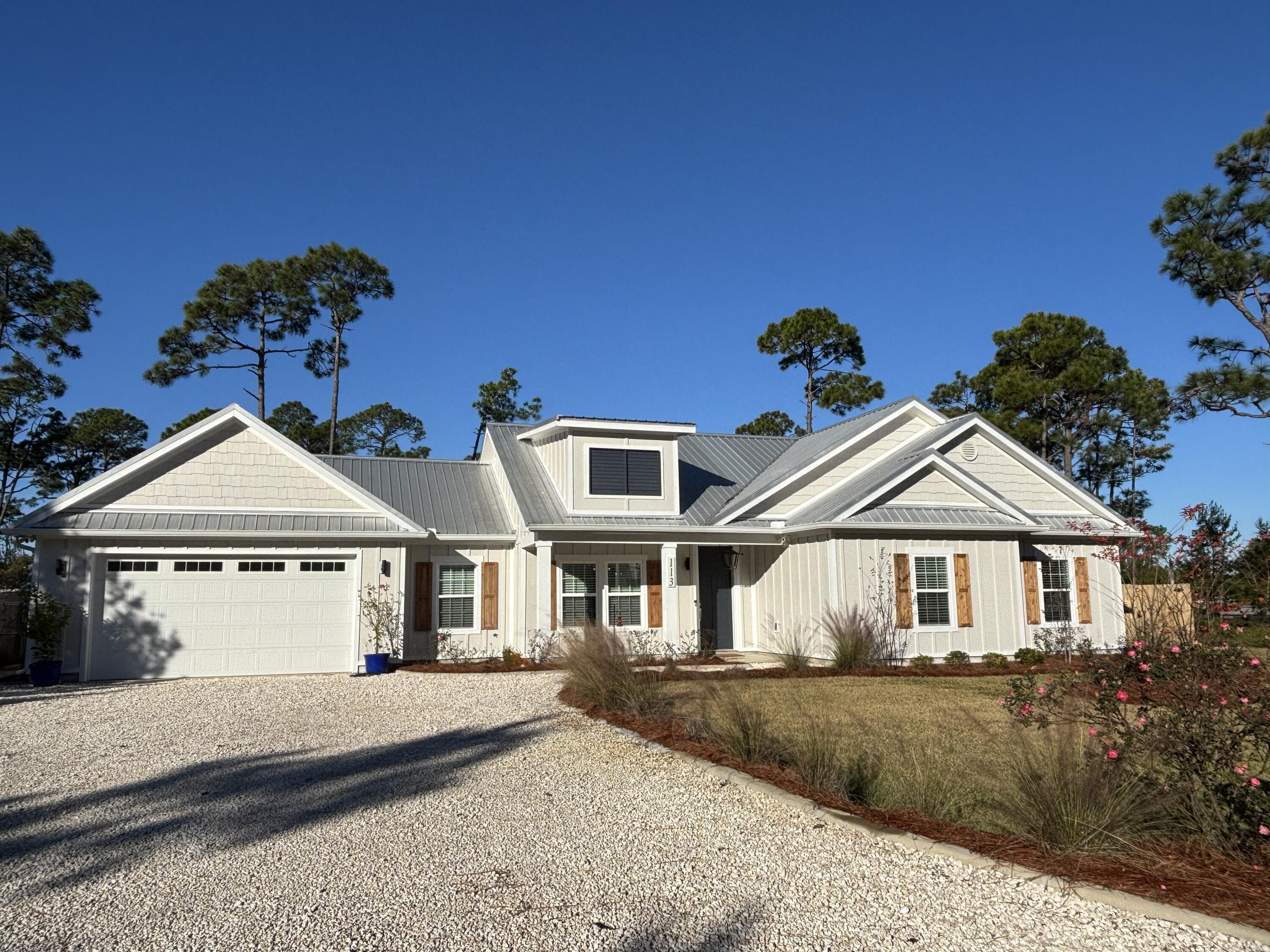 Welcome to 113 Sea Turtle Drive, a stunning modern residence in charming Port St. Joe, Florida . Built in 2023, this impeccable home offers 3 bedrooms, 2 1/2 bathrooms, plus a Mother-In-Law Suite with full bath, and over 2,147 sq. ft. of beautifully crafted living space on a generous quarter-acre lot. Step inside to an open, light-filled interior that harmoniously blends comfort and style. The expansive floor plan provides seamless flow from room to room — ideal for everyday living and effortless entertaining. The heart of the home is a well-appointed kitchen with modern finishes (customize specifics if available), while the adjacent living and dining areas create an inviting atmosphere for gatherings with family and friends. Retreat to the serene primary suite, complete with a private en-suite bathroom and ample closet space. Two additional bedrooms and full baths ensure comfort and convenience for guests or versatile living spaces for a home office, gym, or hobby room. Outside, enjoy a spacious yard perfect for outdoor living, gardening, or play  all within a peaceful neighborhood setting. With a manageable lot size and curb appeal that stands out, this property promises both beauty and practicality. Located just a short drive from scenic Gulf Coast beaches, local dining, shopping, and outdoor recreation, 113 Sea Turtle Drive offers the perfect blend of coastal living and modern comfort. Whether you're seeking a full-time residence, vacation home, or investment opportunity, this home delivers exceptional value and lifestyle. Don't miss your chance to own this remarkable property in one of Florida's most charming coastal communities. About 5 minutes to Port St. Joe or Mexico Beach. HOA with reasonable restrictions and community pool. Easy beach access directly across Hwy 98 via a large public access. Schedule your private tour today! Some dimensions were obtained via the Gulf Co. Property Appraiser's Office, verify if important.
