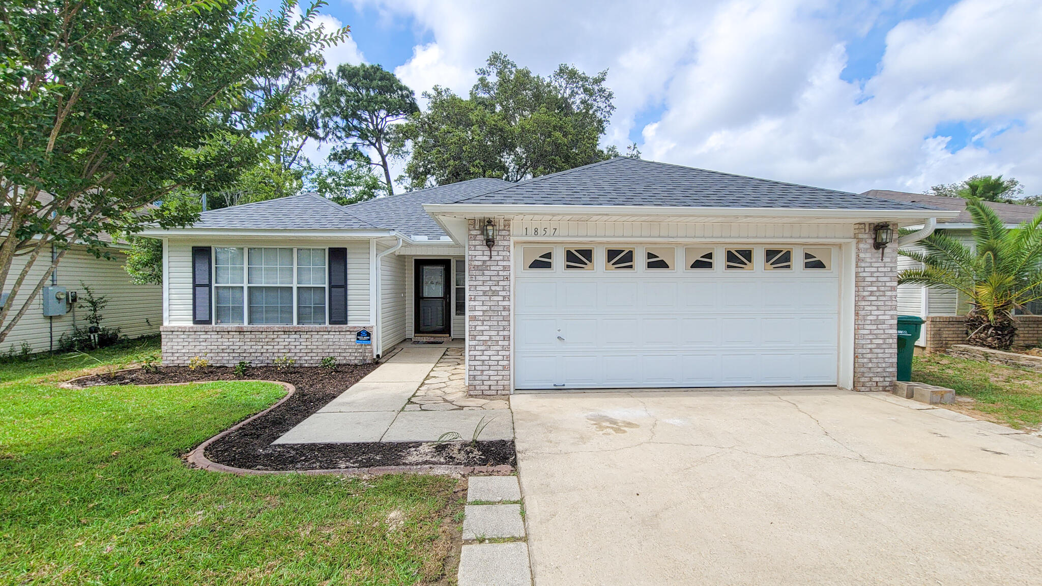 COMPLETELY REMODELED 3 bedroom 2 full bath ranch home located in central FWB, tucked away on a quiet street with no thru traffic! Upon driving up, you will notice the NEW ROOF 2021 & LANDSCAPING! Inside, you'll appreciate the airy and open concept floor plan... All new LVP flooring (new carpet in guest bedrooms). The living room has tall cathedral ceilings and a beautiful corner wood-burning fireplace with shiplap accent wall. The kitchen has all new custom cabinetry with soft-close doors, granite countertops, clean white subway tile backsplash, and stainless steel appliances. The dining area has sliding glass doors that lead you outside to the fully fenced backyard, which has a covered patio, large open deck-perfect for summer BBQs- and grassy area! The master bedroom is large and has tray ceilings with accent border and natural lighting.. the master bathroom has all new granite counter tops, double vanity sinks, garden tub / shower combo and a walk-in closet. Across the house are two additional large guest bedrooms with ample closet space. Full guest bathroom sits between these bedrooms and also has new vanity and granite countertop.

The laundry area is indoors off the kitchen, and also doubles as a pantry / storage area. AC 2012. This home has a 2-car garage + hurricane reinforced garage door. This property would make for a great permanent residence AND/OR a long term investment property.