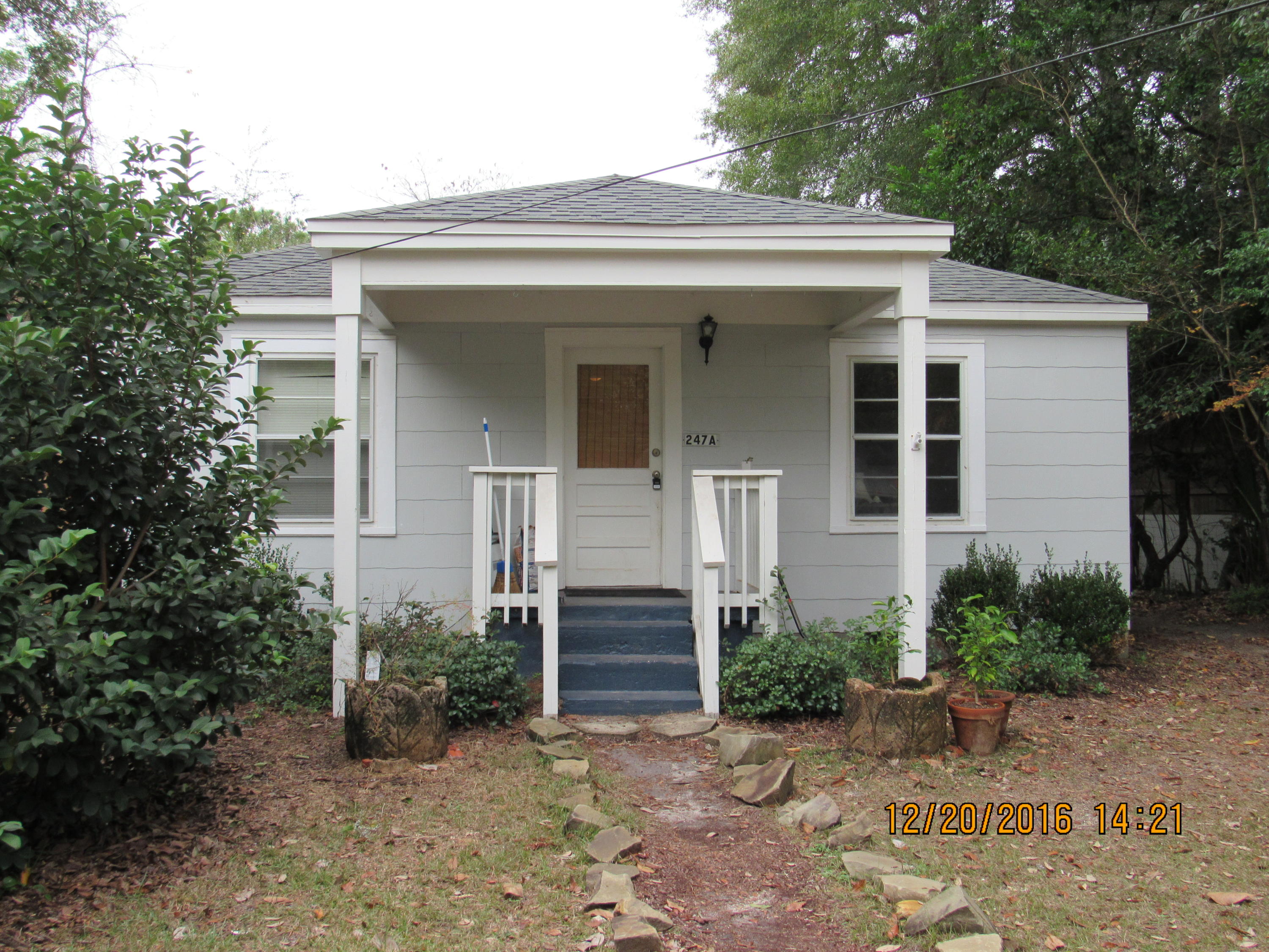 Available February 6th! This charming, well-maintained, 2 bedroom, 2 bath Florida cottage is well-built and conveniently located. This beautiful home boasts solid heart pine original wood floors which have been refinished in the living room and bedrooms as well as new, updated lighting/fan fixtures. The eat-in kitchen has plenty of cabinet space, a big window, and a pantry. Built-in cabinets with shelving and updated tiled showers adorn both bathrooms. The level front yard is ornamented with fruit-bearing lime and mango trees, and the easily-maintained back yard is completely privacy-fenced for seclusion. No pets; no inside smoking.