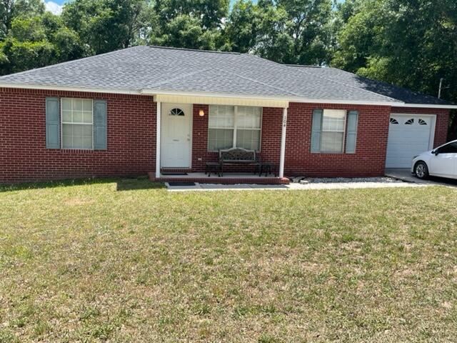 What a FIND!! .78 Acre, Lot on a dead-end street with unbuildable Woods at side and back!  And immaculately maintained, all brick home built by a Quality, hometown builder with NEW roof (2022) New HVAC - 2021, New Treated Deck (2022)  and new French doors on order.  Walk to Bob Sikes School!  Located in one of the most popular, in town neighborhoods, Adams-Powell S/D.  Minutes to all conveniences!  Add the neat outdoor shed/storage/workshop - to store, to build with Two lean-tos to store a boat, or trailer and with a workbench - this owner cleans fish there!  Water and Electricity added.  Graveled Drive from Street to Shed.  AND, being on the end of a dead-end street - ample room for guest parking - a  lot different than many locations!   This will not last long, so call to view! The total lot size is .78 acres, however, there is a drainage easement on the far East side.  See Diagram under "documents"  Also see aerial with lot dimensions under "documents"   Directly across street is only a back drive from a home that fronts on Phillips St. to the North.  The Builder of this home has a reputation for building quality, energy efficient homes.  This home is on a Septic system, was pumped about 5 years ago, no problems noted.  This will save on your City Water Bill.