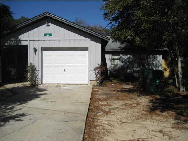 Quaint home centrally located in the heart of Shalimar. This home boasts an updated kitchen that is open to the living area with ample room. The baths have been updated as well . Tile flooring in living areas and baths.Carpet in the bedrooms only. Large back yard for your entertaining. Very convenient to all area bases, beaches and shopping. Call to make an appointment to see today. No pets will be allowed