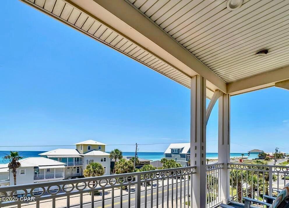 Aloha Beaches - Steps to the Sand | Private Pool | Gulf Views. Welcome to Aloha Beaches, your ultimate Panama City Beach investment property. Just 100 feet from the sugar-white sand, this spacious three-story coastal home offers excellent potential as a short-term rental, vacation retreat, or income-producing asset. Designed for comfort and entertainment, it provides the ideal setup for large groups and families looking to enjoy the Gulf Coast lifestyle. What You'll Love: Private heated pool for relaxing after beach days 4 bedrooms plus a bonus lounge area that can sleep up to 14 guests 4 full bathrooms offering convenience and privacy Elevator access to all three floors Gulf views from the expansive top-floor balcony Multiple king suites with private balconies First-floor suite with kitchenette and pool access ideal for guests seeking privacy Bright, open-concept living area perfect for gatherings and entertaining The home is fully appointed with coastal finishes, stylish furnishings, and thoughtful details that make it turnkey and ready to perform as a high-income rental. Location Highlights: Situated on the desirable west end of Panama City Beach, this property offers a peaceful setting just minutes from Pier Park, 30A, and top dining, shopping, and entertainment. Guests love the combination of tranquility and convenience, making Aloha Beaches a consistent favorite among vacation renters. Whether you're seeking a strong cash-flowing investment property or a personal coastal getaway that pays for itself, Aloha Beaches delivers unmatched lifestyle and income potential on Florida's Emerald Coast.