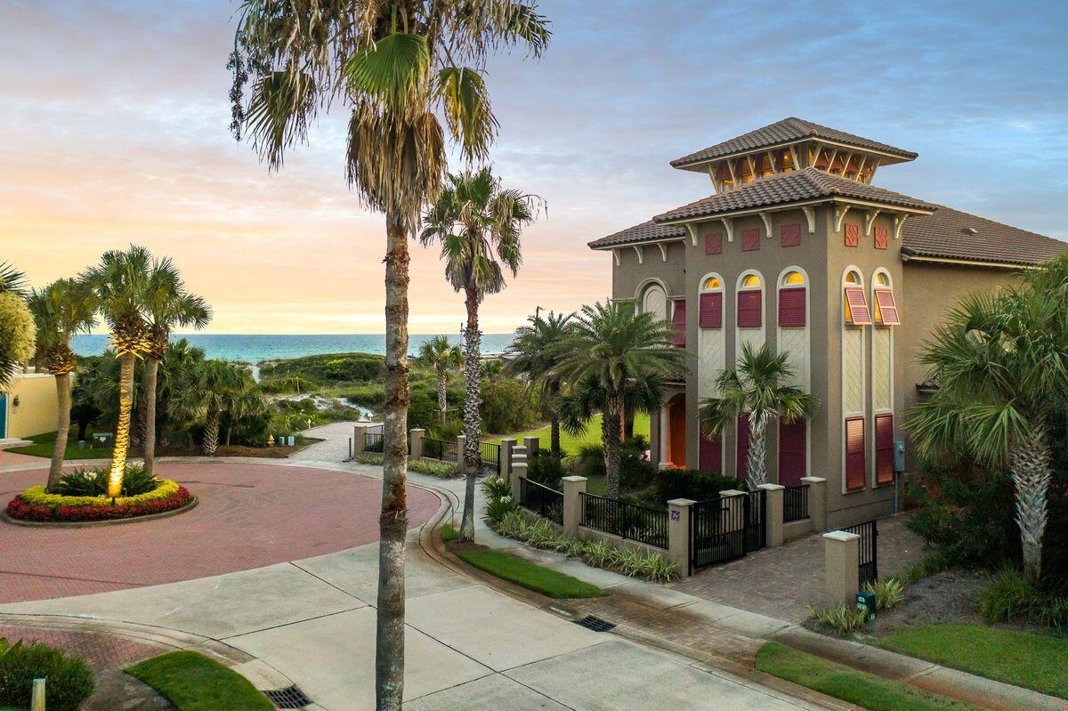 Sale includes the homesite to the South (Parcel ID 27-2S-21-42810-000-0340.) Evoking the charm of New Orleans Garden District, this Caribe masterpiece is tucked on a tree-lined street at the end of a quiet cul-de-sac, just steps from the neighborhood's private beach access. Encompassing 3,832 square feet, this four-bed, four-and-a-half-bath home sits on Rue Martine inside one of the most prominent gated communities in Miramar Beach. 

Built in 2016 by Boswell Builders, this fully customized home more than delivers on gulf views, which you can enjoy from nearly 1,800 square feet of balcony space. Walk through the home's impressive foyer, which provides access to first-floor guest accommodations and a bunk room, an oversized laundry room and an expansive wraparound porch. A private elevator gives you access to the home's second floor, which is complete with a luxurious master suite that includes a gas fireplace, balcony access and an ensuite bath with walk-in shower and soaking tub. The kitchen has been expertly outfitted with Wolf and Sub-Zero appliances, custom cabinetry and a large center island with space for seating. A wall of windows lending pristine gulf views serves as a boundary between the living room with gas fireplace and outdoor living. Accents of marble, tile and wood flooring, as well as custom doors, elliptical archways and interior millwork result in a home that is second to none. This home is not currently on a rental program and features a one-car garage for vehicle storage or beach toys.  

Caribe is ideally located to take advantage of the best of both Destin and South Walton, from dining to shopping and entertainment. Caribe owners enjoy private beach access, two community pools, tennis courts, a private lake and 24-hour security.
