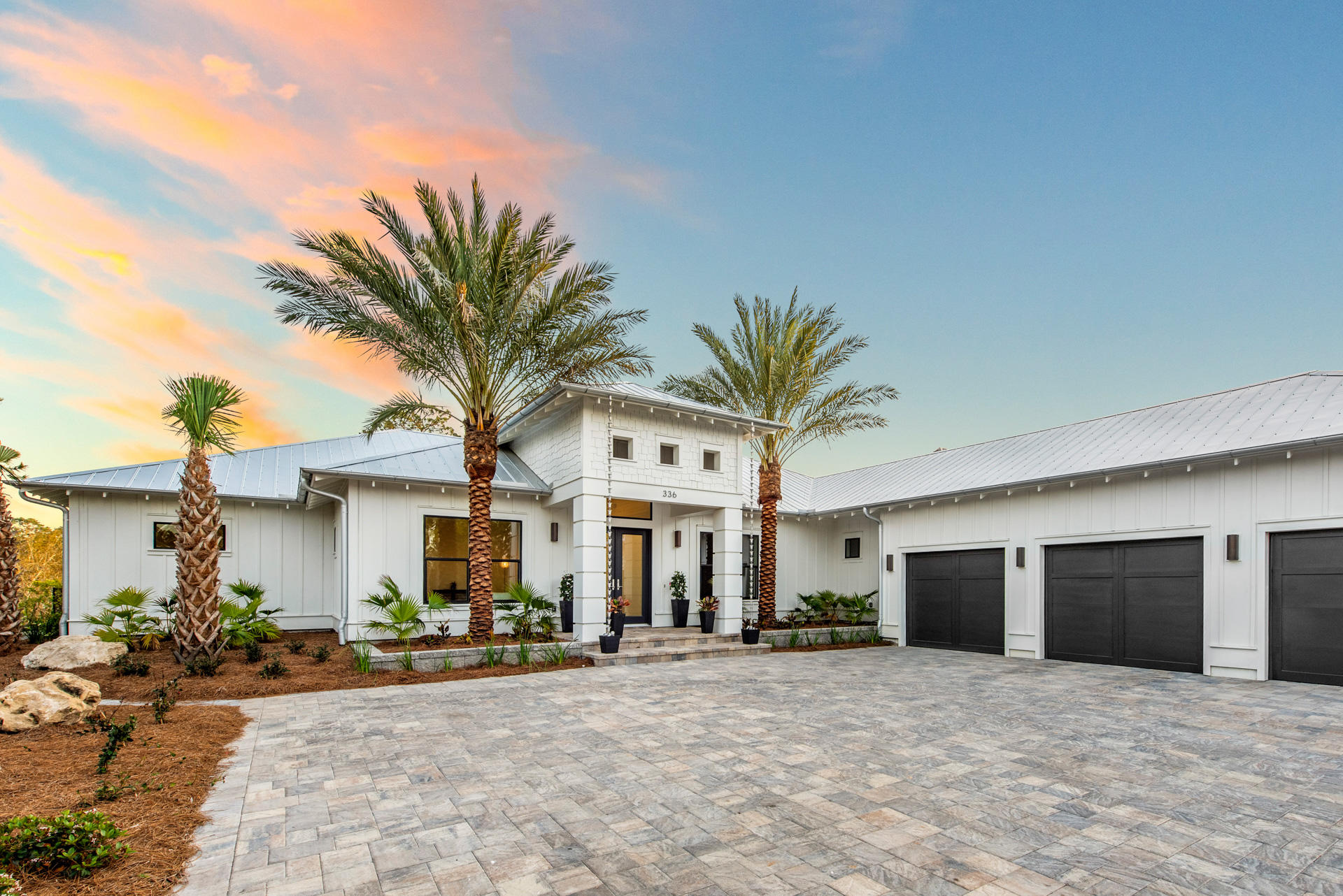 Ideally situated waterfront in Driftwood Estates, this stunning new construction home includes 100ft of water frontage on Buck Bayou, with rare deep water access. A 42' covered slip that allows a boat up to 50 ft in size, alongside a 250 pound ice maker with fish freezer in the garage, make this home ideal for an avid fisherman. The home features a clean, modern style with a natural color palette, leaving each room feeling spacious and inviting. Experience expansive water views from the kitchen, dining, living, and master bedroom, providing plenty of natural sunlight throughout the home's open floorpan. A large master bedroom with vaulted ceilings leads into an elegant master bath complete with rain shower, and spacious stand alone bathtub. Spend your summer days in this home's gorgeous waterfront outdoor space including large covered lanai, outdoor fireplace, swimming pool, and private putting green!