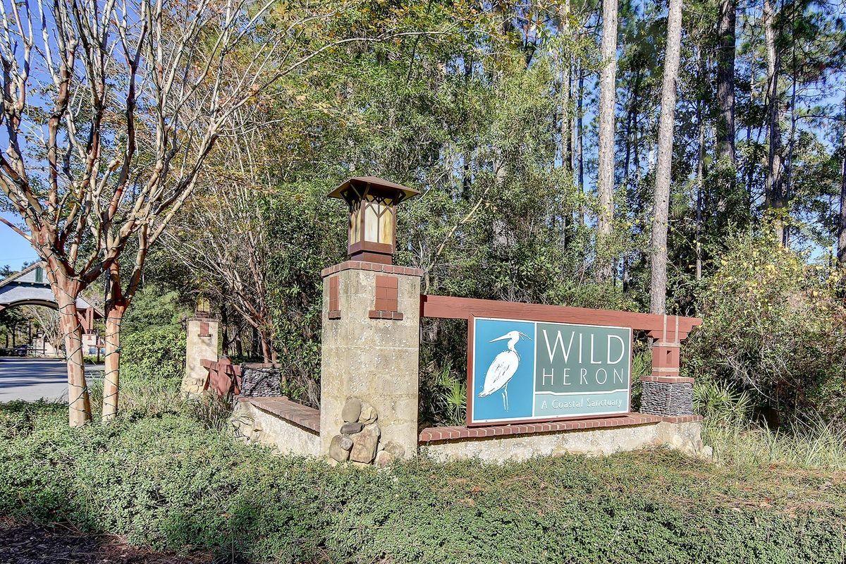 This is a substantial size lot located on Marsh Point Lane in Wild Heron - a gated golf course community. The property is located near the community's gated entrance and offers potential views of Lake Powell. Wild Heron homeowners have access to several amenities, including a fitness center, tennis center, and fire pit, as well as a waterfront clubhouse, golf club, and a dock on Lake Powell. With over .75 acres to customize, and ideally located near popular Walton County beaches as well as Panama City Beach hotspots, this is a perfect opportunity for those who appreciate an active lifestyle and want to take advantage of everything the Emerald Coast has to offer.