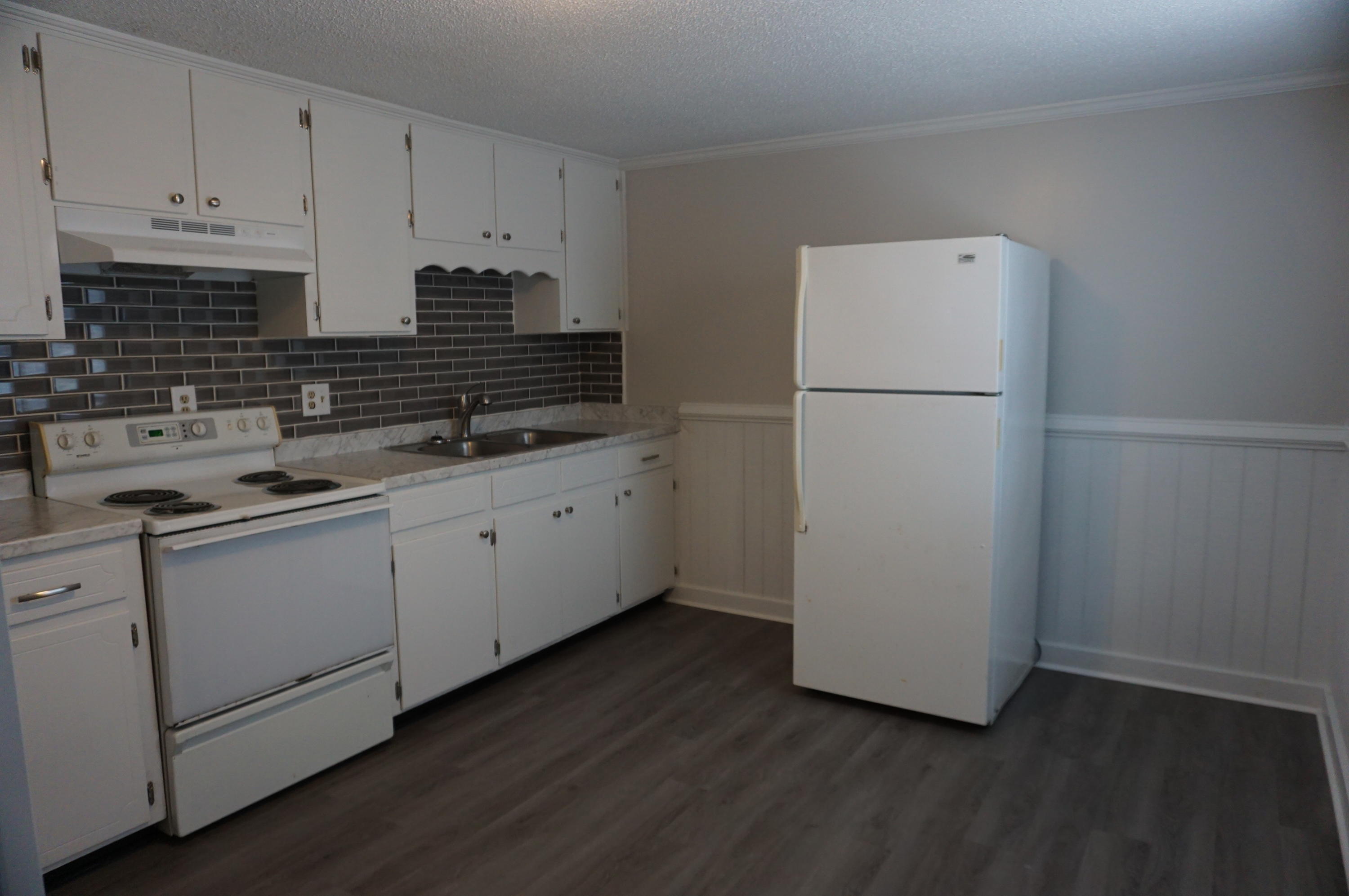 Available 04/20/2022.  End unit upstairs with easy commute to bases, beaches and shopping.  Recently renovated apartment with 2 bedrooms and 1 bath.  Featuring many new renovations.  Neutral paint, vinyl plank flooring, subway tile in the bathroom and kitchen back splash with updated lighting.  Parking lot for parking.  Minutes from the base gate.  Quarterly pest control service.  No smoking.  No vaping.  No pets allowed.