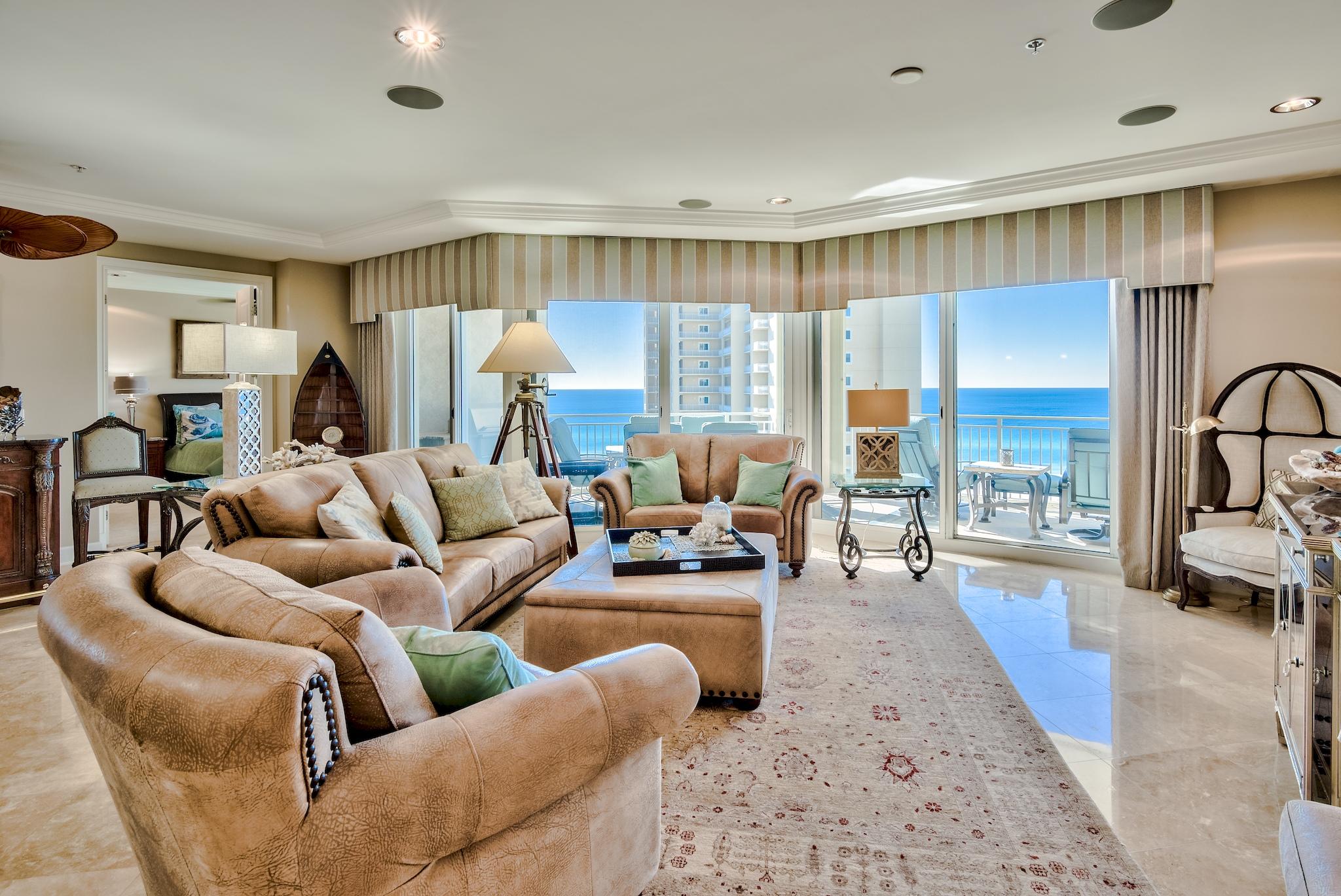 Incredible 4-bedroom Gulf front east corner Villa with stunning views from every room! This Villa is the largest floor plan in the North Tower boasting 3,030 sq ft. Semi private elevators bring you directly to your Villa's private foyer. Once inside you are surrounded with serene Gulf views and stunning polished travertine flooring throughout main areas. The open floor plan & raised ceilings allow the property to feel very spacious. The living area is lined with floor to ceiling windows allowing spectacular Gulf views right from the sofa. Step outside on the expansive private balcony to unwind from the day. The 11' deep balcony even offers a built-in gas grill, a perfect addition for outdoor dining & true coastal living! This phenomenal unit overlooks 70+ miles of our beautiful coastline. Enjoy dining and entertaining guests outdoors with the beautiful backdrop of the shimmering Gulf of Mexico. The amazing chef's kitchen features stainless steel appliances, granite countertops, and a large breakfast bar. The kitchen truly is a chef's dream with lots of countertop space to prep, ample cabinets for storage, gas range, and a double oven. The spacious dining area can accommodate a large crowd and comes complete with a gorgeous dining table and chairs. Gulf views can also be enjoyed while dining and there is also a fantastic added bar & chairs which is great for entertaining. The storage area by entry has an additional fridge and wine fridge. This Villa is being sold fully furnished and turnkey ready, making it the perfect primary residence or second home. 

The Gulf front master suite is pure elegance with Gulf views illuminating the fine crown molding and tray ceiling. Step directly out on the balcony from the master to enjoy a mesmerizing sunrise and fresh Gulf breeze. The master features two walk-in closets and an en-suite bathroom. The luxurious master bath features a walk-in tile shower with dual shower heads, jetted tub with travertine surround, and a large double vanity with granite countertop. Two of the guest bedrooms have Gulf views and en-suite bathrooms, a real treat! All 3 guest bedrooms are generous in size with one consisting of two twin beds and lovely Bay views. 

Grand Dunes is a secured, Gulf front, gated resort with upscale amenities including private high speed elevators that open directly into the foyer of each unit, designated beach with seasonal beach service and private boardwalk with wash stations, large Gulf front lagoon pool surrounded by Palm trees with a cascading waterfall & hot tub, a private second pool & hot tub for the North Tower, grand lobby, tennis, ample underground parking, Gulf front exercise room, private Owners' Lounge, conference room, billiard area, and 2 suites for overflow guests. This property does not allow short term rentals and offers a residential experience. Live at South Walton's finest high-rise development and enjoy easy, low maintenance, beachside living. This unit will not last long!