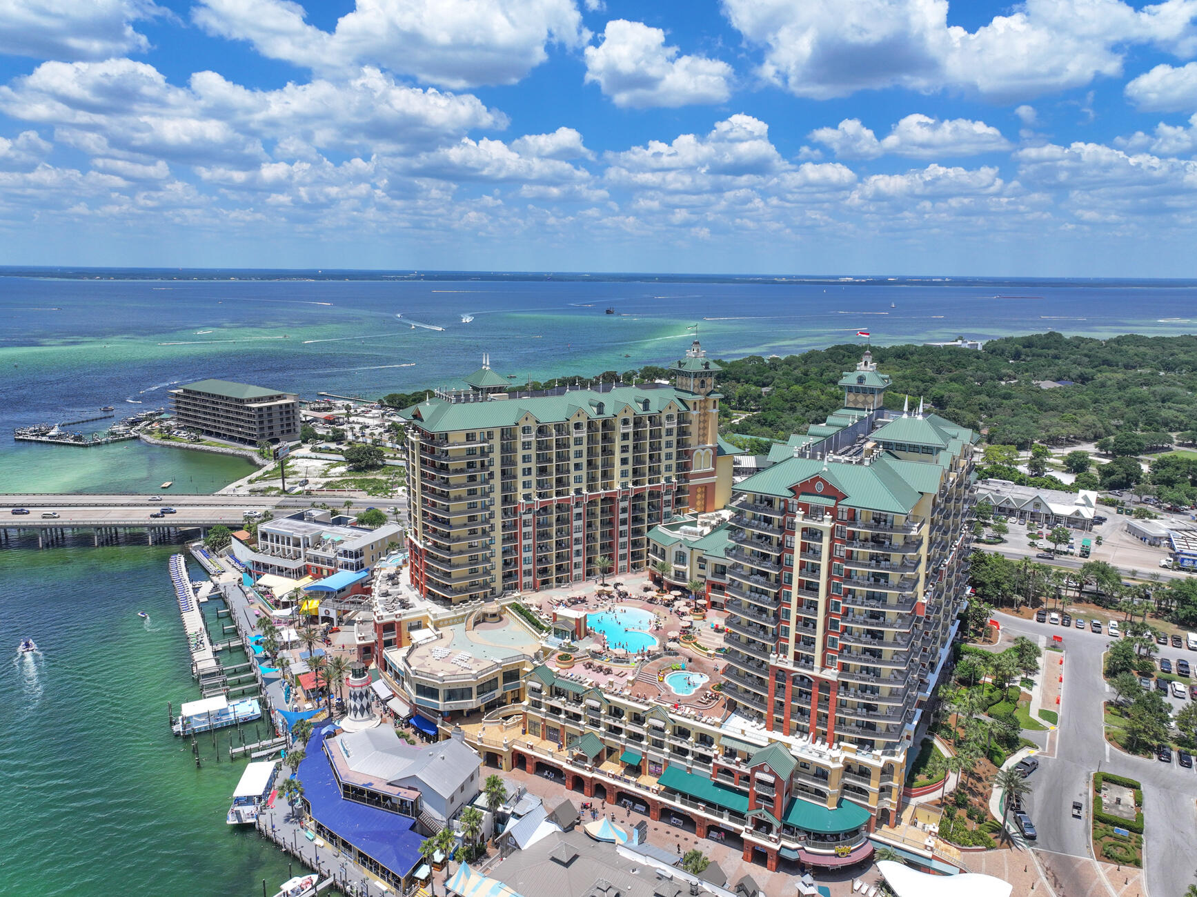Best priced 3 Bedroom/3 Bath Unit in Emerald Grande by far!  Looking for a luxurious vacation rental in one of Destin's premier destinations? Look no further than this stunning 3 bedroom, 3 bath condo with breath taking Gulf and Harbor views.  This Contemporary unit comes fully furnished making it the prefect turnkey vacation rental investment opportunity or home away from home retreat. And with the added bonus of Harborwalk Village just steps from your door, you'll be able to enjoy some of the best shopping, dining, water sports, world class fishing and entertainment Destin has to offer. Plus, a shuttle is conveniently available for nearby beach trips.  Don't hesitate to schedule your showing today and experience the ultimate coastal destination. YTD rentals as of Sept 2023 exceed 68K.