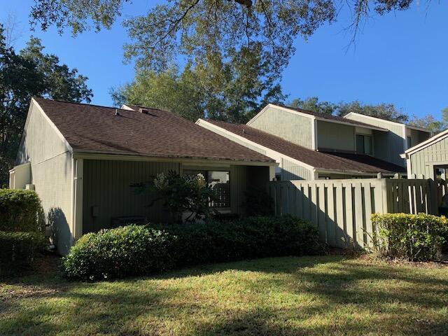 Come take a look at this wonderful patio home and enjoy all the amenities Bluewater Bay has to offer! A front courtyard welcomes you while also providing privacy for your personal outdoor living space. This end unit has an updated kitchen with beautiful warm wood cabinetry, stainless appliances, silestone counter tops and tile backsplash with open shelving. The adjoining breakfast room is light and bright with sliding doors providing access to the front courtyard. Kitchen, bathrooms and Florida room have tile and the rest of the home has brand new luxury vinyl plank flooring.  A wood burning stone fireplace separates the living and dining rooms and the open floor plan also has vaulted ceilings. The master bedroom has sliding doors leading to the rear courtyard as well as a walk-in closet. The second bedroom has a walk in closet as well and can accommodate large furniture. The heated and cooled Florida room is light and bright and could be used as an office or exercise room.  This home is surrounded by beautiful landscaping and has additional outside storage. You'll want to see this home in the prime location of Royal Oak Village in Bluewater Bay!