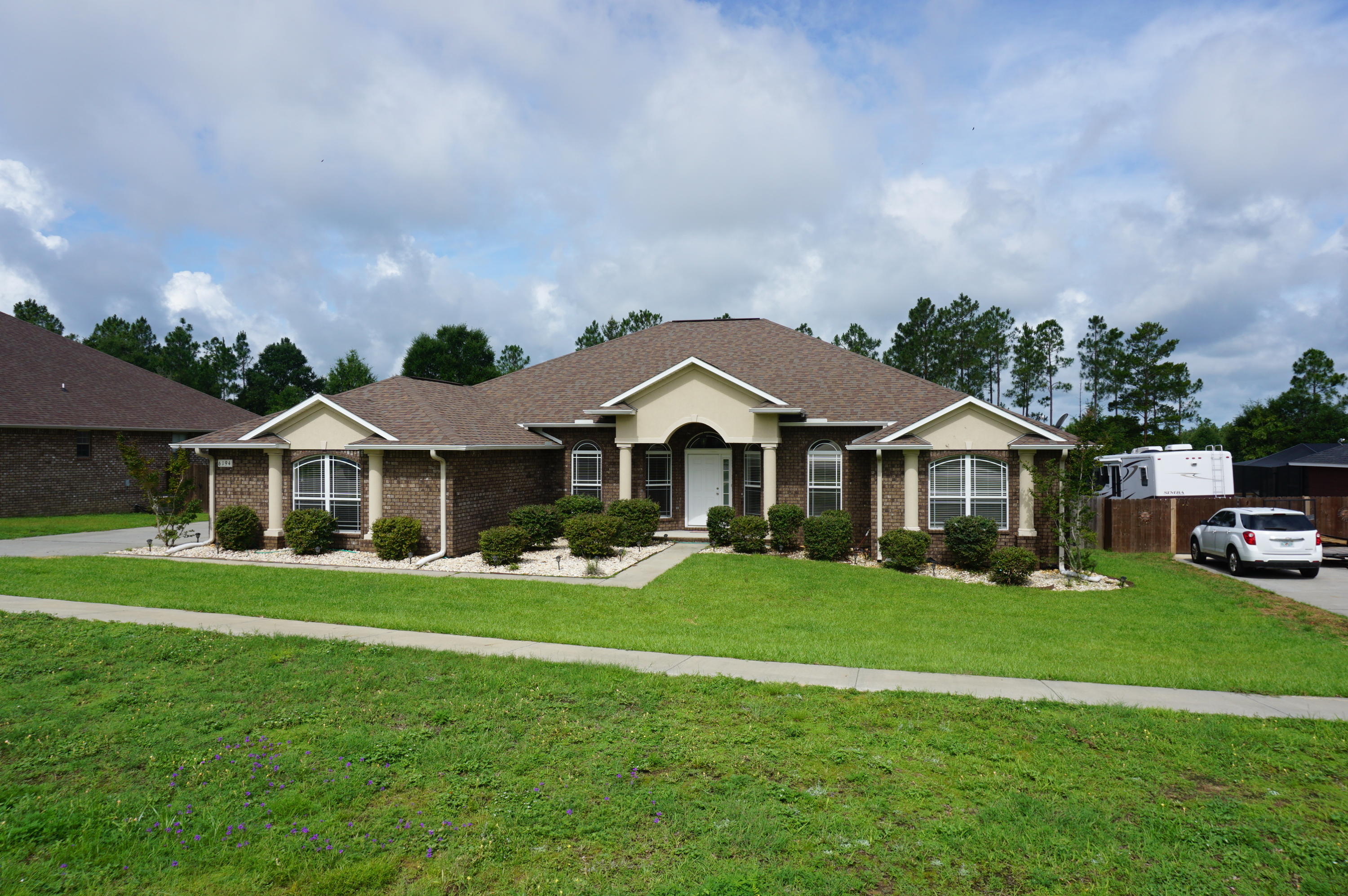 Available 07/08/2022.......1 YEAR LEASE ONLY...North Crestview home features over 3000 SQFT of living space, 4/3 floor plan and 3 CAR GARAGE...Spacious living room, formal dining room, office space, Florida room, 4 spacious bedrooms, 3 full bathrooms and so much more. Kitchen boasts granite counters, beautiful cabinetry, breakfast bar, eat in kitchen and large pantry. Open back deck with custom brick pavers. Privacy fenced back yard, oversized parking driveway, and 3 bay garage. This home is in a small subdivision in the country with large level lots with room and privacy. No inside smoking or vaping. Pets will be allowed with a $400 nonrefundable pet fee and owner approval. Lawncare included in rental rate.  Perfect rental if you only need a years lease or less.