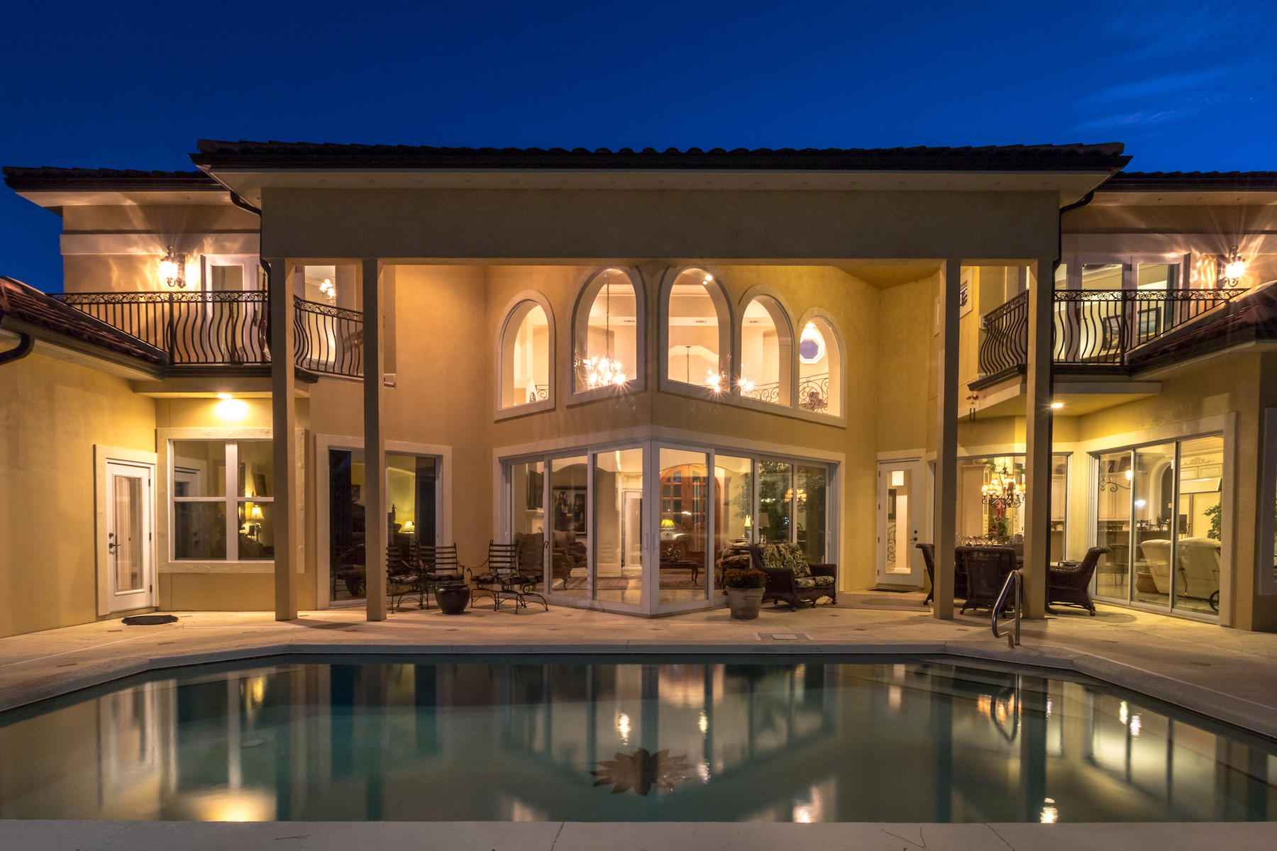 Just 7 minutes north of Sandestin and Grand Blvd yet worlds away rests a beautiful custom Mediterranean estate situated on 100 ft of Choctawhatchee Bay. This showpiece's timeless, luxurious appointments; open, airy floor plan; and opulent landscaping are matched in exquisiteness only by the surrounding natural scenery. A large expanse of glass seamlessly merges the interior with the outdoors. A spectacular, fenced-in bayfront oasis features a large pool and covered sitting area. Characteristic of Mediterranean architecture, this well-designed home features a grand entry, umber tones, sweeping classic lines, wrought iron accents, a barrel tile roof, and an abundance of alfresco living. Jerusalem tile adorns the first floor, and intricate millwork is found throughout. Custom design finishes include: a custom front door, custom lighting, designer sink vessels throughout, 2 large, stone fireplaces designed by Jenkin Brink Co, designer cabinetry in kitchen and baths, and custom railings with solid brass capping. The epicurean kitchen features intricate tile work, custom cabinetry, 6-burner gas cooktop, double oven, granite counters, breakfast bar, and breakfast nook. It is easily accessible to main living, keeping room, formal dining, and lanai for entertaining. This home offers a private study and a separate media room that can easily be turned into a 5th bedroom. Both the 1st floor and 2nd floor master suites offer private outdoor access and luxurious en suites. The 2nd floor offers dual wet bars. In addition, this home features a new Rinnai hot water system, two new A/C systems, new paint in many areas inside/out, W/D on both floors, 2 separate garages, full irrigation system, and alarm system. Driftwood Estates is a private community located on a secluded peninsula on the Choctawhatchee Bay and within easy driving distance to Sandestin and 30A.
