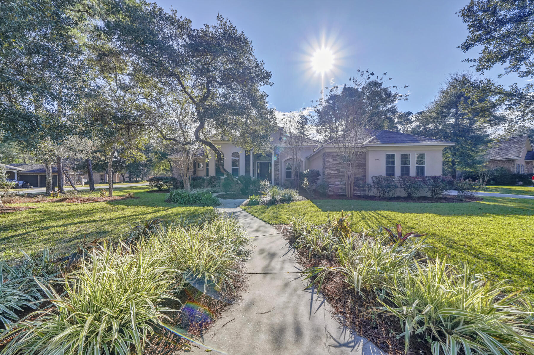 Exceptionally maintained 4 Bedroom 3 Bath home on a corner lot in Swift Creek located on just under .5 acre and full of luxurious architectural features. This 1st Place Parade of Homes Winner includes exterior stone and turret, interior inlayed flooring, concealed walk-in pantry and custom mudroom area. This home also features 2x6 Walls, Icynene Insulation on the Roof Deck and Garage, Impact-Rated Windows, Central Vacuum, and a Rinnai Tankless Hot Water. The Den's magnificent circular wall with arched windows, the 12' pocket sliding glass door that extends the Great Room outside onto the Patio for entertaining, and the Great Room's barrel vault coffered ceiling, built-in cabinetry, 5.1 Surround Sound, and Fireplace make this home stand above most others in Swift Creek. The oversized kitchen has lots of cabinet space, a grand island, 36'' GE gas cooktop, 42'' GE refrigerator, under/over cabinet lighting, wine refrigerator, and an awesome concealed pantry.   This Arthur Rutenberg & Robert Fisher build is located just across the street from the community amenities to include: Pool, Community Room, Tennis & Basketball Courts, Walking Trails, Playground, and Lake Park.  This gorgeous home is a must see! Check out the *3D Virtual Tour* & make an appointment to see it today.