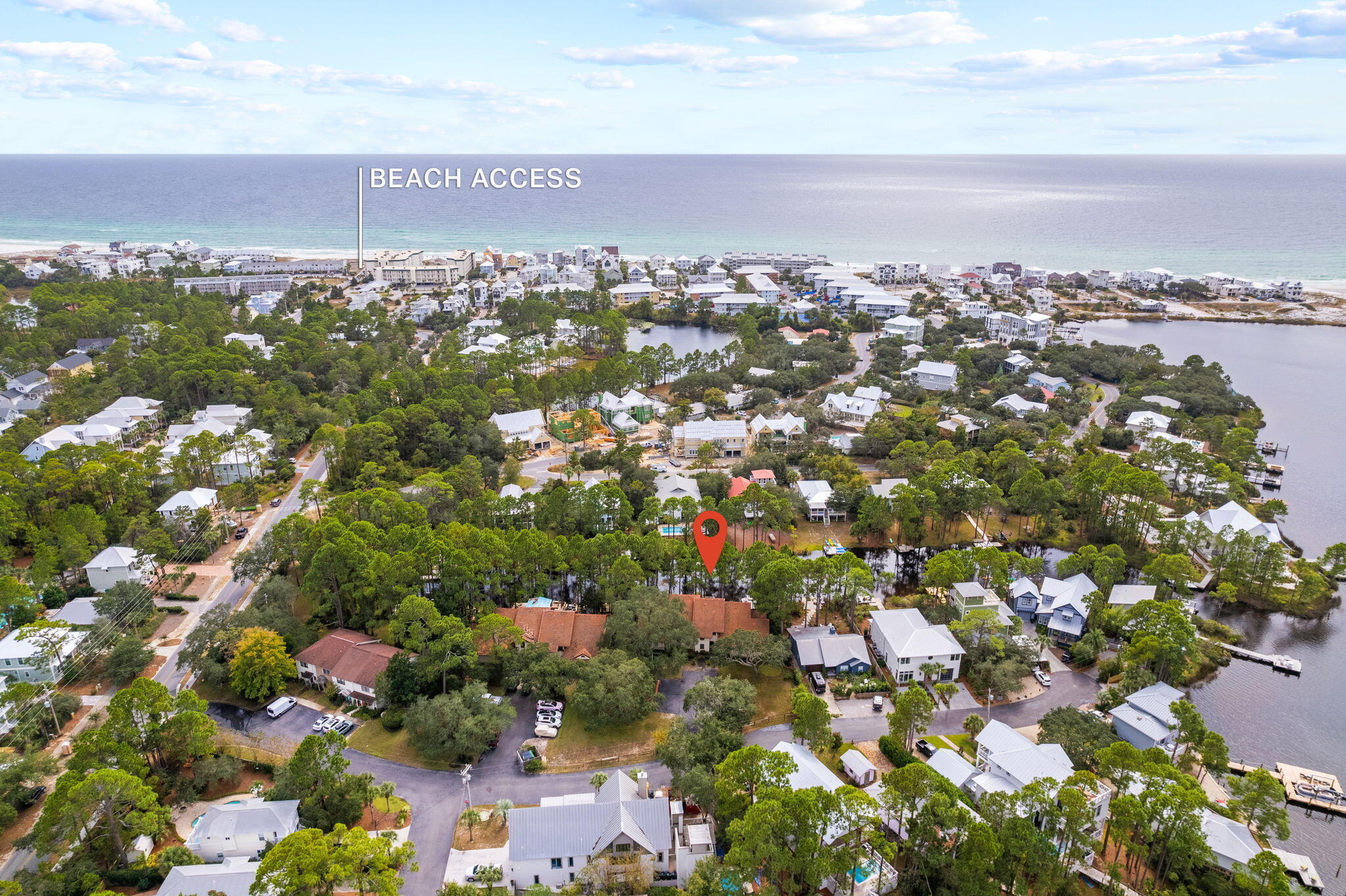 Escape to the natural beauty of coastal living with this charming townhome located south of 30A, offering a private dock on the serene Eastern Lake canal. Immerse yourself in the simplicity and tranquility of this inviting property, where Unit 9 provides a comfortable 1376 square feet of heated and cooled living space, featuring 2 bedrooms and 2.5 baths.

Step out onto the welcoming porches that overlook the calming waters, creating a peaceful ambiance that invites relaxation and rejuvenation. Whether you're starting your day with a cup of coffee or winding down in the evening with a gentle breeze, these picturesque views will be a constant source of serenity.

To ensure long-lasting quality, the association recently installed a new metal roof in 2023, providing reliable protection and a fresh look to the exterior. The thoughtful exterior painting adds a touch of character, enhancing the overall appeal of this delightful townhome.
This property presents a wonderful opportunity to experience the joys of coastal living at an affordable price. Located south of 30A, on the scenic Eastern Lake, you'll have easy access to the pristine beaches and a host of local attractions. Embrace a relaxed coastal lifestyle, where you can unwind, explore, and create lasting memories.