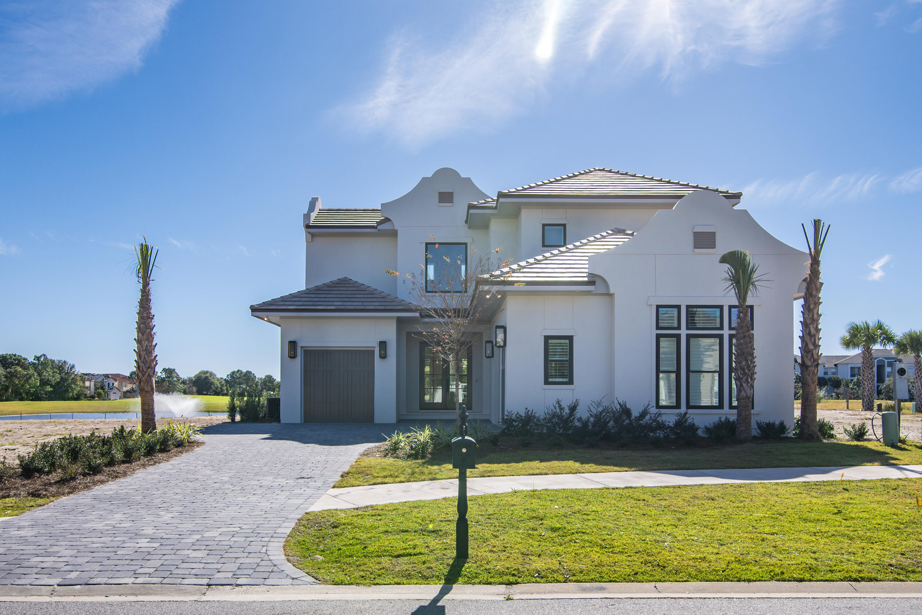 Tradewinds is the newest community in Regatta Bay consisting of 54 homes. The homes will have a West Indies style of architecture with a Dutch influence.  *Watch video to see what it's like to live in Regatta Bay.  
The new homes will have a modern flair with custom details, high end finishes, courtyard pool options and lots of outdoor living space.  This beautiful home is under construction and already has all of the designer chosen finishes selected and on order.
*designer selections are located in the documents section Built by Destin Custom Home Builders utilizing the most current technology for each build using only the finest materials and high end finishes such as:
Wind and impact Resistant Windows 
Wind and impact rated doors,
Insulated, wind and Impact rated garage doors, 
Foam spray insulation in roof for Superior energy efficiency, 
Insulation in All interior walls for energy Efficiency and sound proofing, 
Insulation between floors for sound Barrier, 
Stucco homes equipped with EnviroDry liquid waterproofing house wrap,
Gas lanterns,
Stainless steel door hinges,
Custom wood shelving in all closets,
Kohler plumbing throughout, 
All showers have KBRS waterproofing systems specifically Designed to maintain integrity & durability,
Air conditioning zones for maximum efficiency,
Custom solid wood cabinets throughout with soft close hinges,
Smart home technology customizable for homeowner, 
Led lighting throughout,
and so much more... 
 
Don't forget to watch the Regatta Bay Lifestyle Video to see what it's like to live inside this beautiful gated community. We look forward to adding you to our growing list of happy clients.
(video is found in the virtual tour)