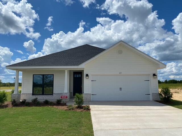 This is a model home that is not for sale at this time.  Located just 20 minutes from South Walton beaches!  Conveniently located within a mile of Freeport High School.  This Craftsman style home has 3 bedrooms & 2 baths.  Brick skirt with Hardiboard siding and stylish, black window frames. Open concept plan with a cathedral ceiling in the main living area, 9' ceilings in bedrooms 2 & 3 & a 10' trey ceiling in the Master Bedroom.   8' entry doors, quartz countertops and durable CoreTec Pro Plus luxury vinyl plank flooring in main living areas, carpet in bedrooms.   Fully sodded yard, sprinkler system with well and pump, garage door opener and pull-down attic stairs are all included!  Seller pays most closing costs with an approved lender.
