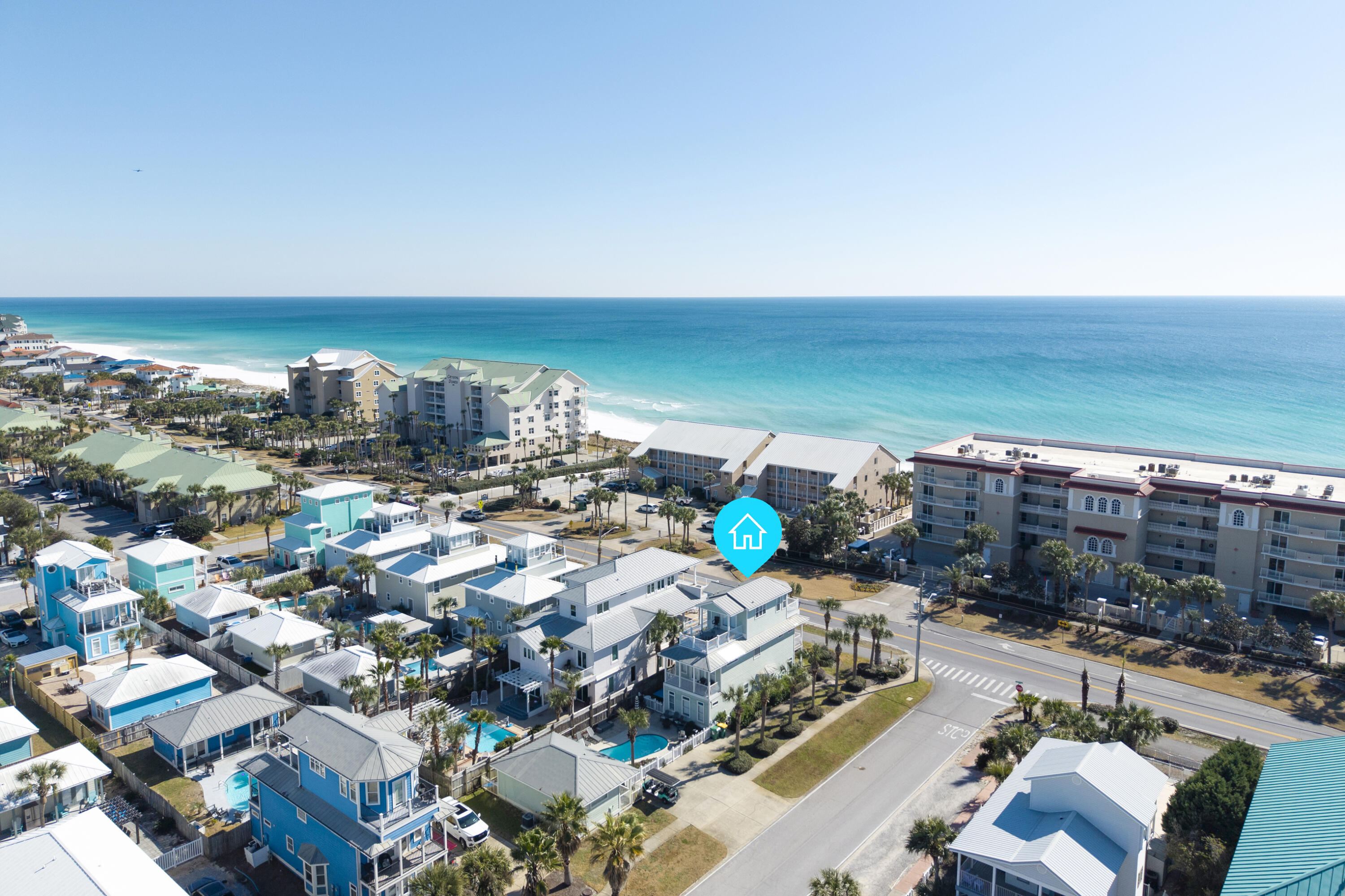 Located directly along Scenic Hwy 98 on a prominent corner lot, this exceptional three-story coastal retreat offers Gulf views from the second & third levels and is just 0.1 miles from the Shirah Beach Access, a leisurely 2-minute stroll to the sugar-white sands. Thoughtfully designed & impeccably maintained, the property presents a rare ''two-homes-in-one'' configuration ideal for personal enjoyment & high-performing short-term rental use. The 4-bedroom main residence is complemented by a separate 2-bedroom carriage house, with a heated pool & pool deck serving as the private focal point between the two structures. This flexible layout provides privacy & versatility well-suited for hosting guests, multi-generational living, or maximizing rental potential. The carriage house also features a kitchenette, a full bathroom, and a walk-in closet, offering comfortable & independent accommodations. The home is tastefully decorated & offered turnkey, featuring solid surface flooring throughout, multiple living areas, and balconies positioned to capture Gulf breezes & views. A golf cart is included, enhancing convenience for beach access & easy enjoyment of the surrounding coastal community.

From an investment perspective, the property demonstrates outstanding performance, generating $225.1K in rental income in 2024, $235.4K in 2025, and already securing $129.2K in confirmed bookings for 2026. With its prime Scenic 98 location, Gulf views, flexible accommodations, and proven income history, this offering represents a compelling opportunity in one of Destin's most sought-after beach communities.