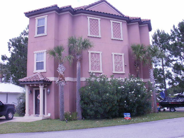 Motivated Seller!! All offers will be considered !!! THIS HOUSE IS PRICED BELOW APPRAISED VALUE !!!!
This is a lakefront home located in the lake community of Shoreline Estates.This beautiful home is just minutes from the beach. This is a 3 story home with the master bedroom on the third floor offering incredible views of the lake. The house has two balconies and a ground floor patio with lake views. Some of the many extras are 20'x20'tile floors,and builtin speakers throughout the house. The downstairs kitchen has beautiful granite countertops with tile flooring. The half bath in on the ground floor. There is granite in all bathrooms.Tall ceilings with crown molding are extarordinary. Put this house your must see list. Accepting Backup offers, contract is contingent.