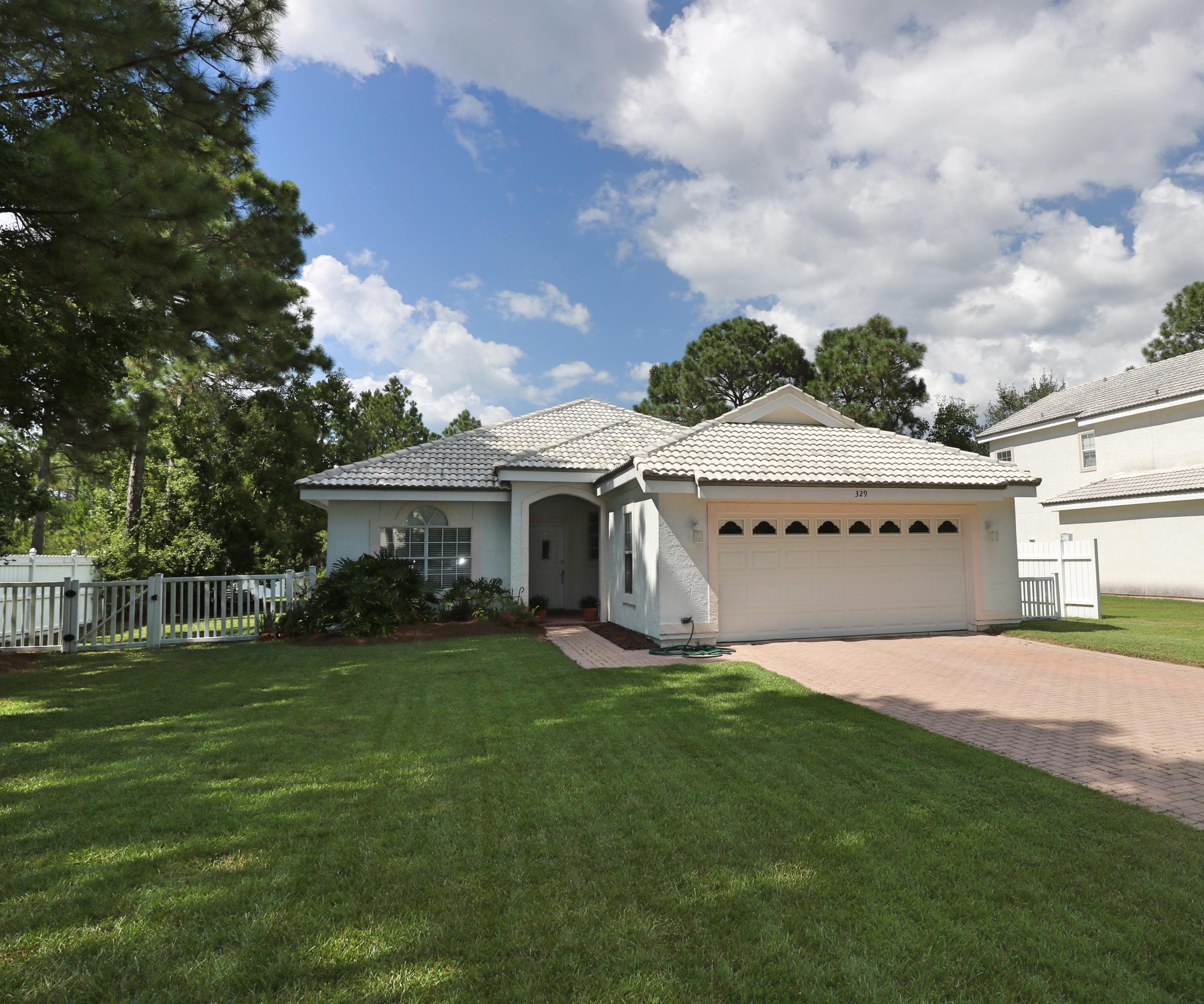 SELLER IS VERY MOTIVATED AND JUST REDUCED TO THEIR BOTTOM LINE PRICE! Perfectly situated in beautiful Seagrove Beach! This charming beach home is conveniently located within walking distance to public the beach, Caf Thirty A and only a 10 minute bike ride from Seaside and other 30A amenities. The home is settled into a quiet gated community on the lake and has been very well cared for by the owner. You will instantly fall in love with all of the charm and character that this beach home has to offer. As soon as you enter into the front door your are greeted with a bright and open floor plan that is perfect for entertaining family and friends. The living room features vaulted ceilings and a cozy fireplace and just adjacent to the living room is the dining area. The kitchen is also pleasing with plenty of counter top and cabinet space, a pantry, comfy breakfast nook and a breakfast bar that opens to the living room with additional seating. The master suite faces the back of the home with lake views and has a private bath. The Seller just tiled the master shower and replaced the tub and tiled the the walls and ceiling in the second bathroom. The two additional bedrooms are also spacious and will both accommodate a Queen bed. As much as you will be delighted with the inside of this home you will be just as delighted with the back patio and yard that offers absolutely stunning views of the lake that is filled with lily pads. It will surely be the gathering spot to enjoy a cup of coffee or to watch the sunset. This home is truly a one of kind and has so much to offer. Other features include a two-car garage, tile floors throughout, 9" and 12" foot ceilings and is one story. Don't miss your opportunity to see this home today!