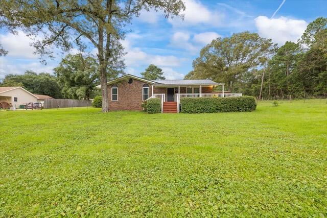 Charming Brick Home on 1.06 Acres - Just Listed!
This well-maintained brick home is situated on a spacious 1.06-acre lot.. It offers peace and privacy with very few neighbors. Inside, you'll find wood floors in the bedrooms and a welcoming layout that flows out to both front and back decks—perfect for relaxing or entertaining. Additional features include a durable metal roof, a concrete storage shed, and a two-car detached carport.
Homes like this don't come along often—schedule your showing today before it's gone! Pets okay with breed approval and pet fee. Available Oct 1