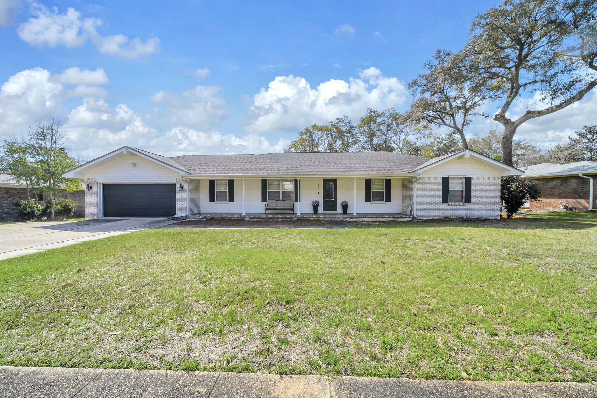 Discover this charming 4-bed, 2-bath home on nearly ½ acre in a quiet, desirable neighborhood. Enjoy a spacious layout, mature trees, and a large backyard perfect for relaxing or entertaining. The home features stylish shiplap accents throughout, adding warmth and character. Outside, enjoy rare creek access, allowing you to launch a kayak or paddleboard from your backyard and paddle all the way to the bay--perfect for outdoor lovers. The home also includes a Rinnai on-demand gas tankless hot water heater for efficient, endless hot water. Conveniently located minutes from Hurlburt Field (approx. 10 min) and Eglin Air Force Base (approx. 15 min). Close to Emerald Coast beaches, shopping, and dining--offering the best of Florida living. Whether you're searching for a primary residence, military relocation home, or a property with unique waterfront lifestyle potential, this home delivers the best of Florida living with adventure right in your backyard. A unique blend of location, lifestyle, and adventure awaits!