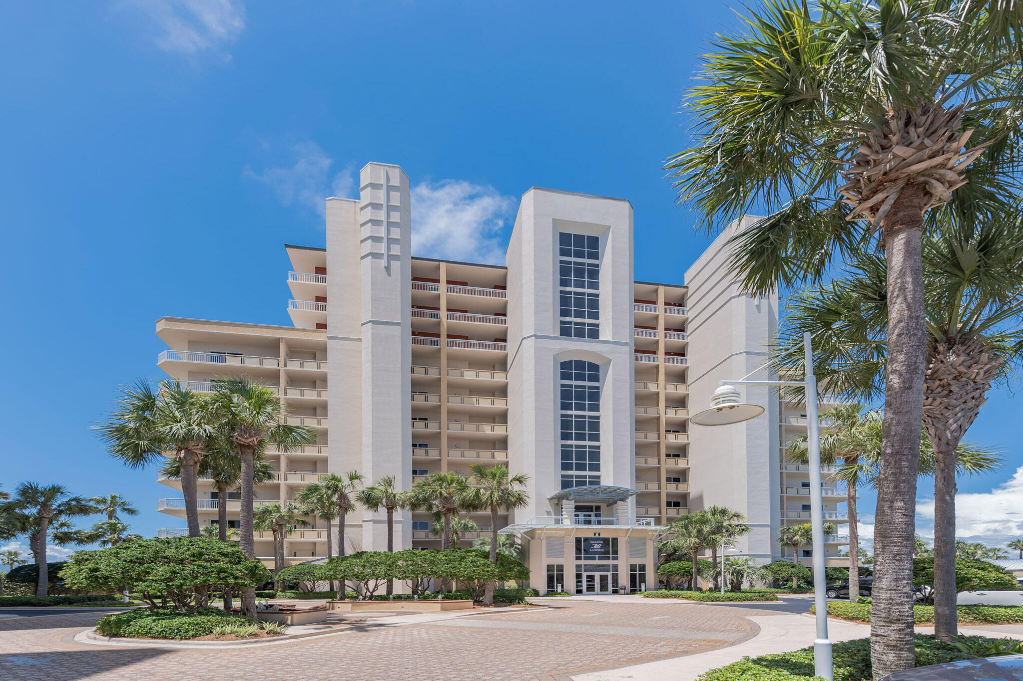 Luxurious harbor-front condo, perfect for the boat enthusiast with a passion for Florida life! The smart open-concept design features tall ceilings, tiled floors, and a cool versatile space that's brimming with natural light. The gorgeous kitchen boasts a huge wrap-around bar that can seat up to 5, great for entertaining and visiting with friends. All 3 bedrooms feature their own private bath, so overnight guests and all members of the household can relax in comfort and privacy. The spacious balcony offers sweeping views of the famous Destin Harbor. Home comes fully furnished and conveys with covered parking space, storage room, and boat slip! Harbor Landing residents enjoy TONS of amenities including deeded beach access, gated security, 2 swimming pools, hot tub, and more. Call today!