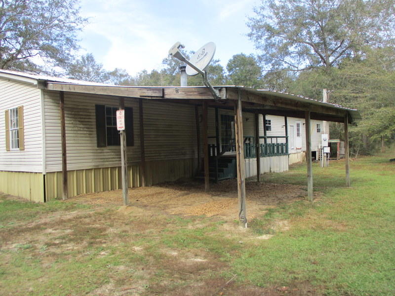 This REO home is located just a few miles north of Hwy 90 and a short ride from either Baker/Crestivew or Holt. Home rests on over 2 acres, was built in 1997 and is just over 2000 sf. Home has tons of potential for those looking for affordability and a little privacy. Seller's asking price is $39900.00