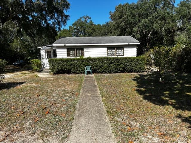 Calling all builders or investors! The sky is the limit with this rare opportunity to own  2 large lots combined with beautiful views of Choctawhatchee bay! Approximately .68 acres perfectly located on the corner of Live Oak Street in this quaint and popular community of Choctaw Beach! There is a single-story home that sits on one side of the lot that is in much need of repair or tear down. There is also an oversized 2 car garage or possible workshop to the left/back of the home. A chain link fence surrounds the entire parameter of the property. You will find some beautiful trees like Mimosa or Walnut trees that compliment this amazing location. Minutes away from Destin and the beautiful beaches of the Emerald Coast! Close to shopping and dining! A sweet gem of a find and an ideal location to build your dream home! Any information in this listing is believed to be accurate, but not guaranteed. Buyer(s) are responsible for personally verifying all details of the property and anything the buyer(s) deem important. This is an "as is" "where is" without warranty sale.