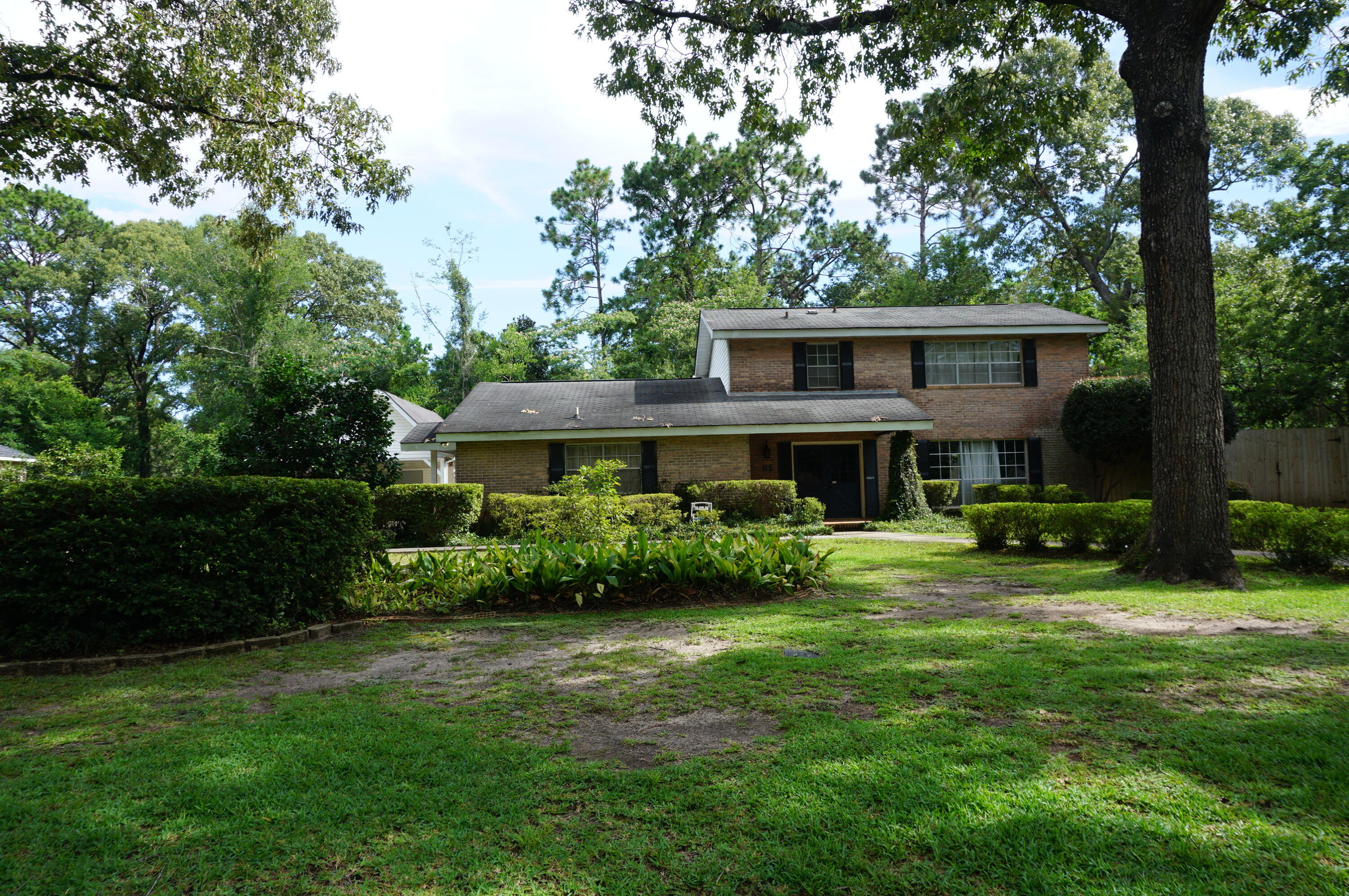 Available 06/30/22.....Nestled in the heart of Crestview with easy access to bases, beaches and shopping with no HOA. This 4/3.5 has over 2300 sq ft. of living space. Covered carport, workshop, grillzebo, dry storage, outdoor cantina, RV parking with hookup, fenced back yard, mature landscaping, and more. Grand entry through double front entry doors. Spacious living room with built-ins. Eat in kitchen dining area with buffet/shelving built-ins over-looking the back yard area through nice windows with natural light. HUGE kitchen with butcher block island and plenty of storage and counter space. 1/2 bath for the guests, large laundry with extras. Library/office, massive Master bedroom with built-ins & walk in closet. Screened weight room with elevated tongue and groove ceiling. No inside smoking or vaping.  Pets will be allowed with owner approval.  Lawn care included with rental rate.  Plenty of space and spacious lot.  This is a must see for the price.