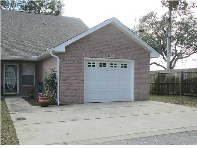 VIP: Very Impressive Property located between both Eglin and Hurlburt Field AFB. This open floor,3 bedroom/2 bath, End unit home offers almost 1,400 square feet of living space. Soaring cathedral ceiling and hardwood floors adds that special touch to Living room/Dining area which flows right into breakfast bar kitchen making entertaining easy. Downstairs bedroom and bath give privacy and separation with additional bedrooms and full bath located upstairs. One car garage has garage door opener and washer/dryer hook up. Quaint backyard with privacy fencing. In great location close to shopping, beaches and schools. Great Investment property with Tenants already in place! Lawn care and pest control covered by HOA. Don't delay, call Faye today! Worth seeing, Worth Owning!